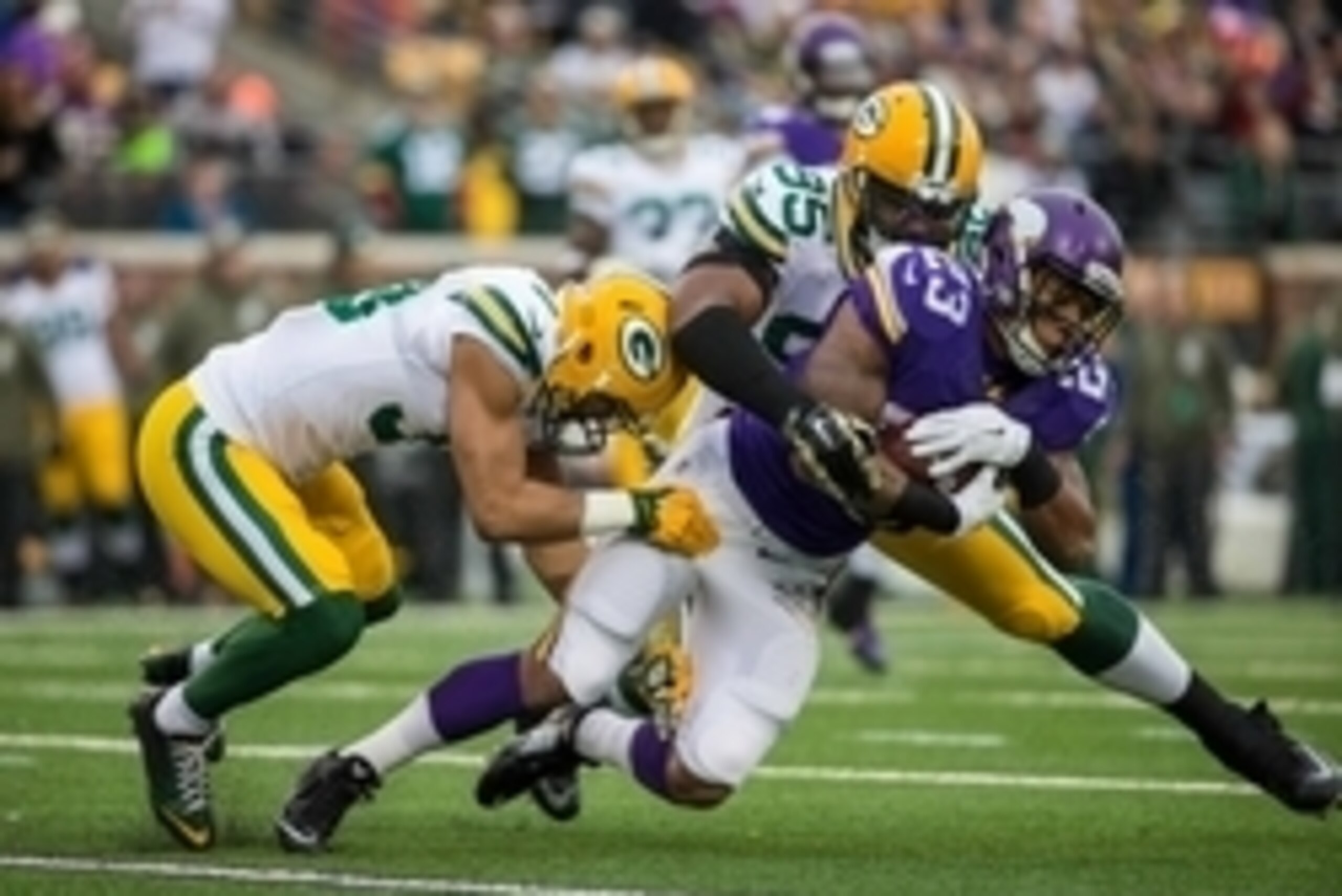 Nov 23, 2014; Minneapolis, MN, USA; Minnesota Vikings running back Joe Banyard (23) is tackled by Green Bay Packers defensive end Datone Jones (95) during the second quarter at TCF Bank Stadium. Mandatory Credit: Brace Hemmelgarn-USA TODAY Sports Nov 23, 2014; Minneapolis, MN, USA; Minnesota Vikings running back Joe Banyard (23) is tackled by Green Bay Packers defensive end Datone Jones (95) during the second quarter at TCF Bank Stadium. Mandatory Credit: Brace Hemmelgarn-USA TODAY Sports