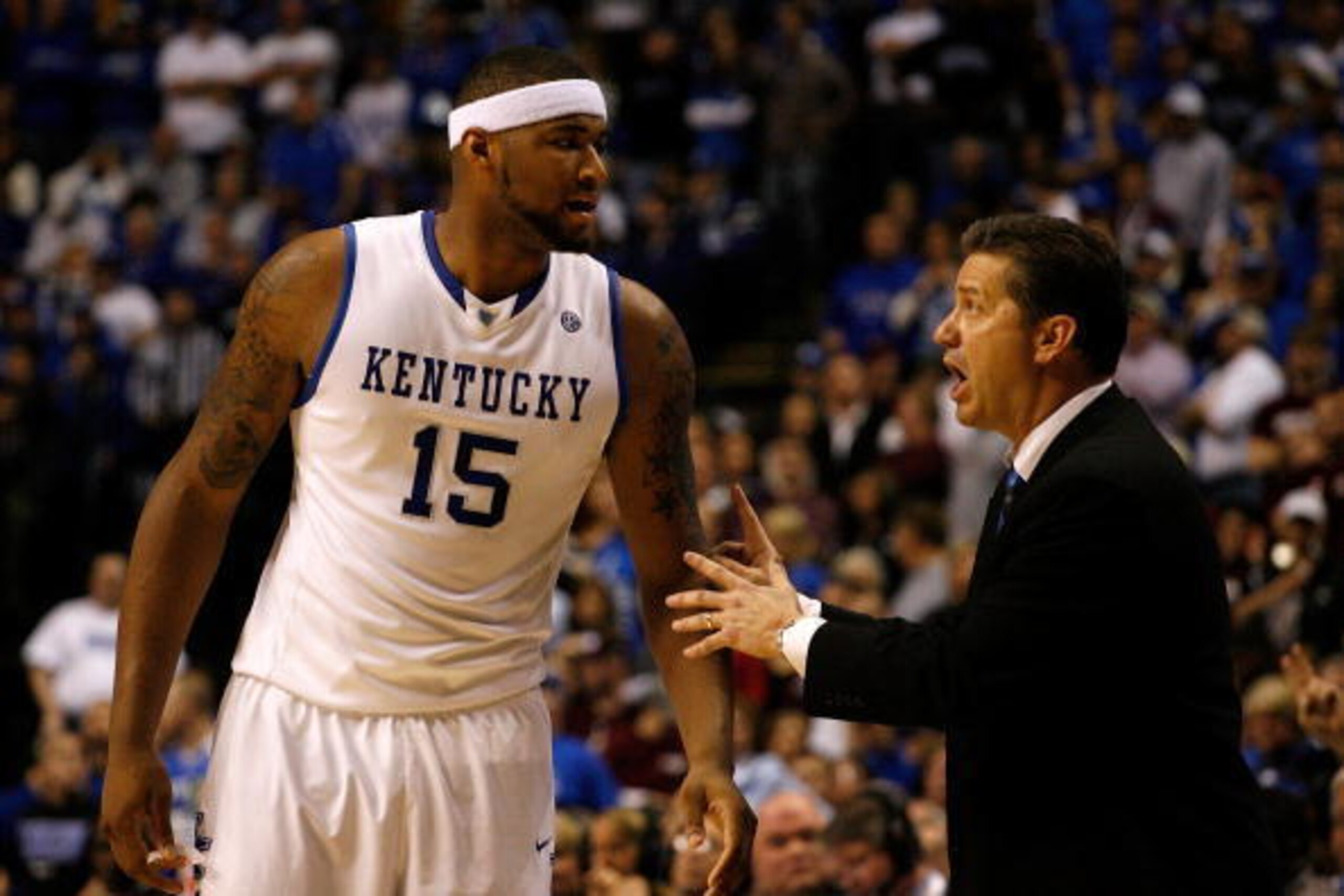 NASHVILLE, TN - MARCH 14:  Head coach John Calipari of the Kentucky Wildcats talks with DeMarcus Cousins #15 against the Mississippi State Bulldogs during the final of the SEC Men's Basketball Tournament at the Bridgestone Arena on March 14, 2010 in Nashv