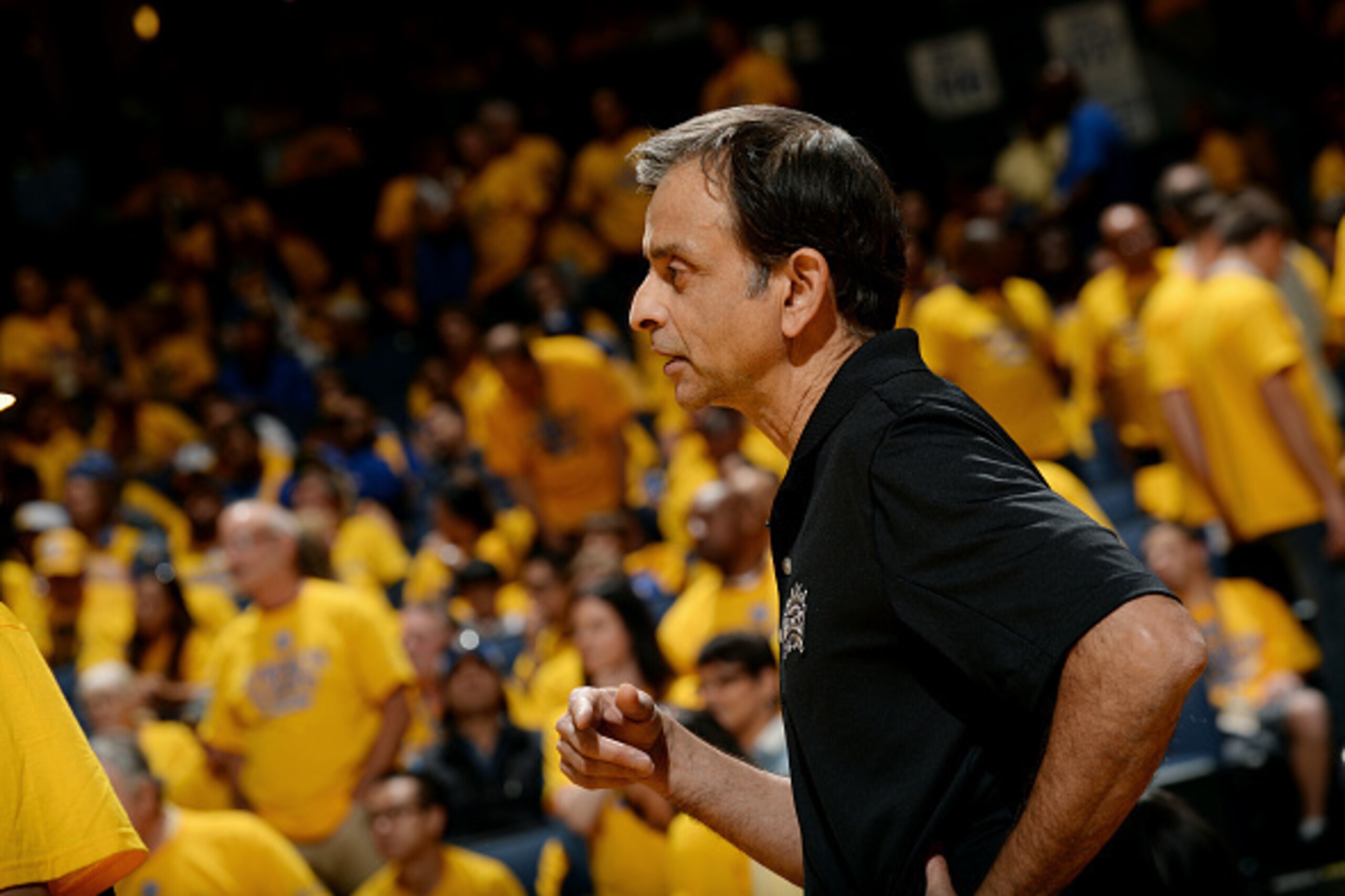 OAKLAND, CA - APRIL 18: Owner of the Sacramento Kings Vivek Ranadive stands on the court during a game against the New Orleans Pelicans and Golden State Warriors in Game One of the Western Conference Quarterfinals during the NBA Playoffs on April 18, 2015