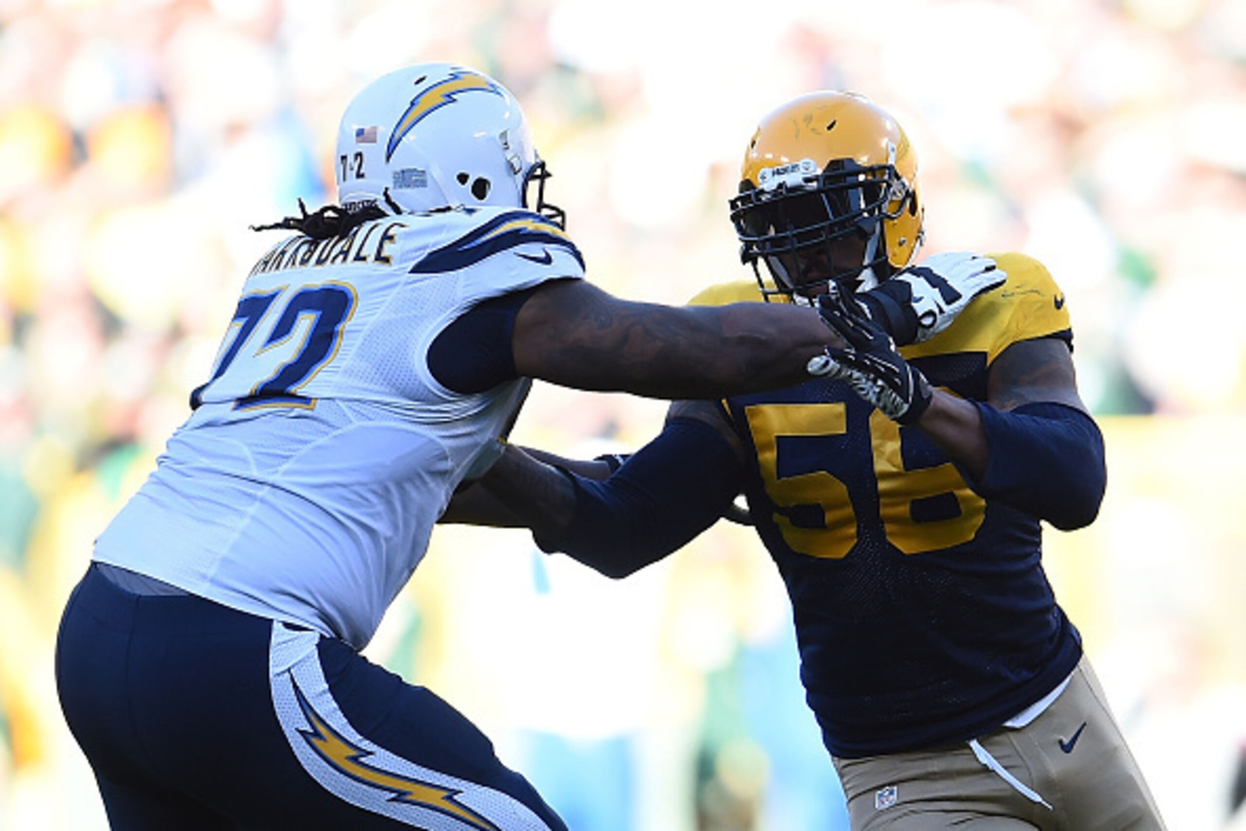 GREEN BAY, WI - OCTOBER 18: Julius Peppers #56 of the Green Bay Packers works against Joe Barksdale #72 of the San Diego Chargers during a game at Lambeau Field on October 18, 2015 in Green Bay, Wisconsin. Green Bay defeated San Diego 27-20. (Photo by GREEN BAY, WI - OCTOBER 18: Julius Peppers #56 of the Green Bay Packers works against Joe Barksdale #72 of the San Diego Chargers during a game at Lambeau Field on October 18, 2015 in Green Bay, Wisconsin. Green Bay defeated San Diego 27-20. (Photo by