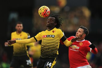 WATFORD, ENGLAND - NOVEMBER 21: Juan Carlos Paredes of Watford and Memphis Depay of Manchester United compete for the ball during the Barclays Premier League match between Watford and Manchester United at Vicarage Road on November 21, 2015 in Watford, Eng