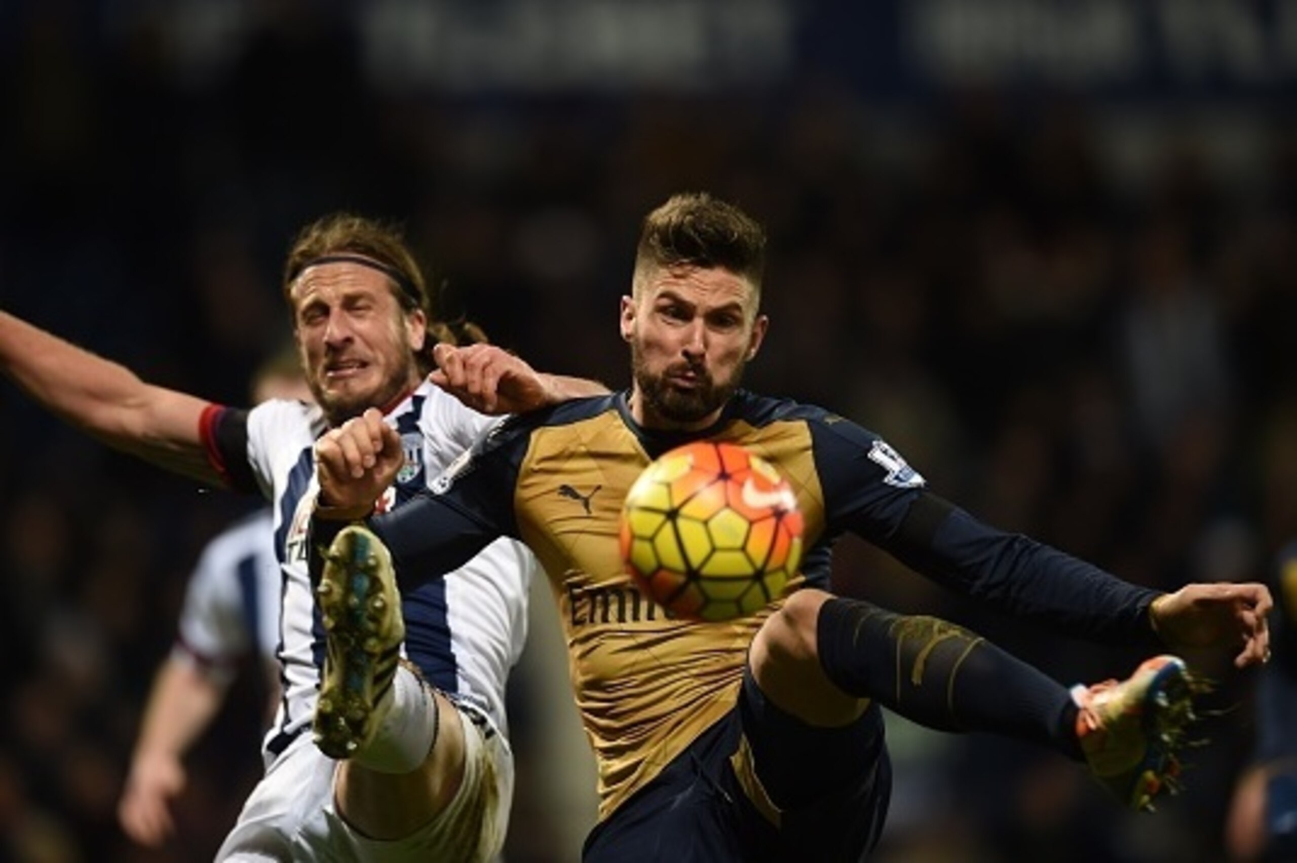 Arsenal's French striker Olivier Giroud (R) vies with West Bromwich Albion's Swedish defender Jonas Olsson during the English Premier League football match between West Bromwich Albion and Arsenal at The Hawthorns in West Bromwich, central England on Nove Arsenal's French striker Olivier Giroud (R) vies with West Bromwich Albion's Swedish defender Jonas Olsson during the English Premier League football match between West Bromwich Albion and Arsenal at The Hawthorns in West Bromwich, central England on Nove