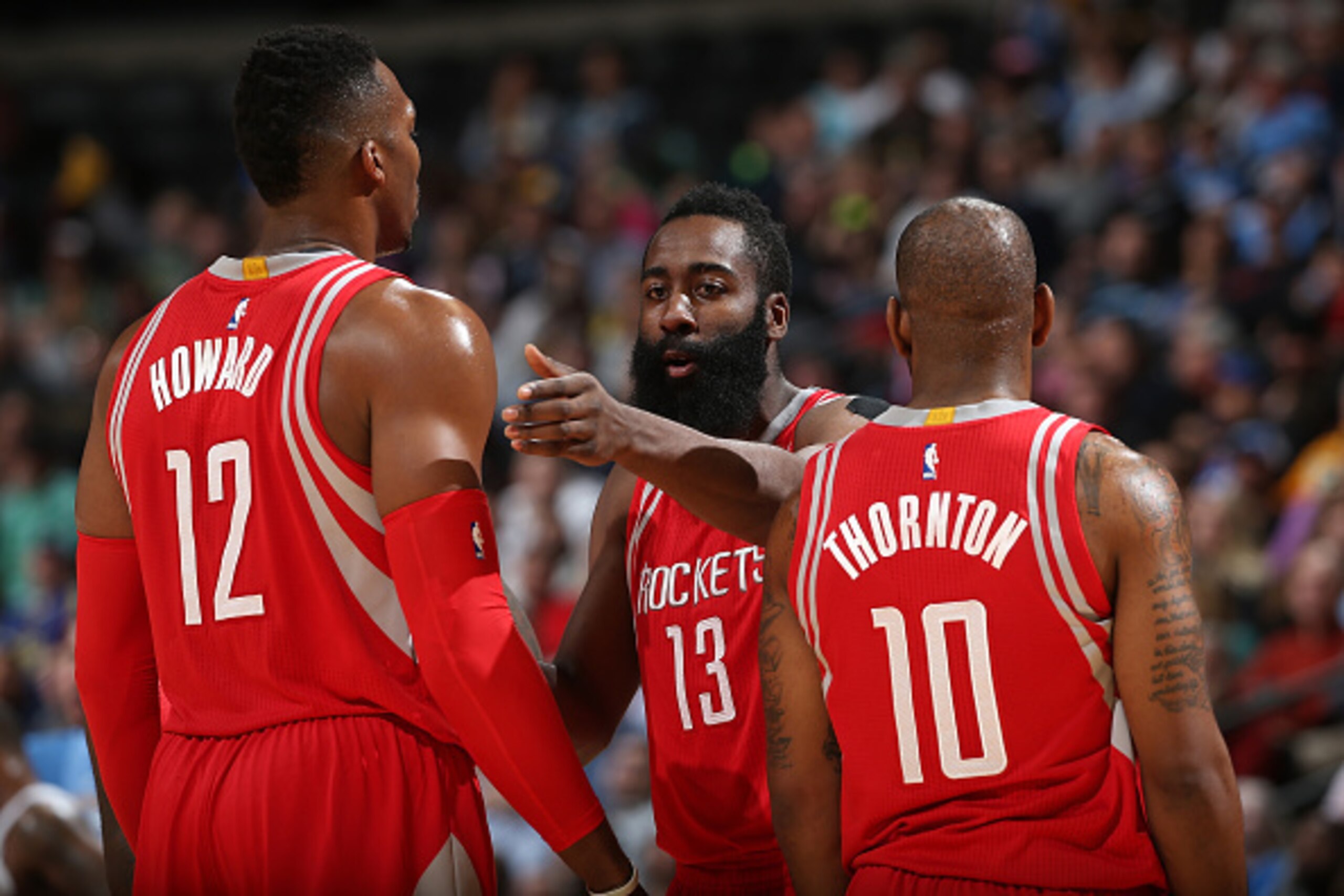 DENVER, CO - NOVEMBER 13: James Harden #13 talks with Dwight Howard #12 and Marcus Thornton #10 of the Houston Rockets during a break in the action against the Denver Nuggets at Pepsi Center on November 13, 2015 in Denver, Colorado. The Nuggets defeated DENVER, CO - NOVEMBER 13: James Harden #13 talks with Dwight Howard #12 and Marcus Thornton #10 of the Houston Rockets during a break in the action against the Denver Nuggets at Pepsi Center on November 13, 2015 in Denver, Colorado. The Nuggets defeated