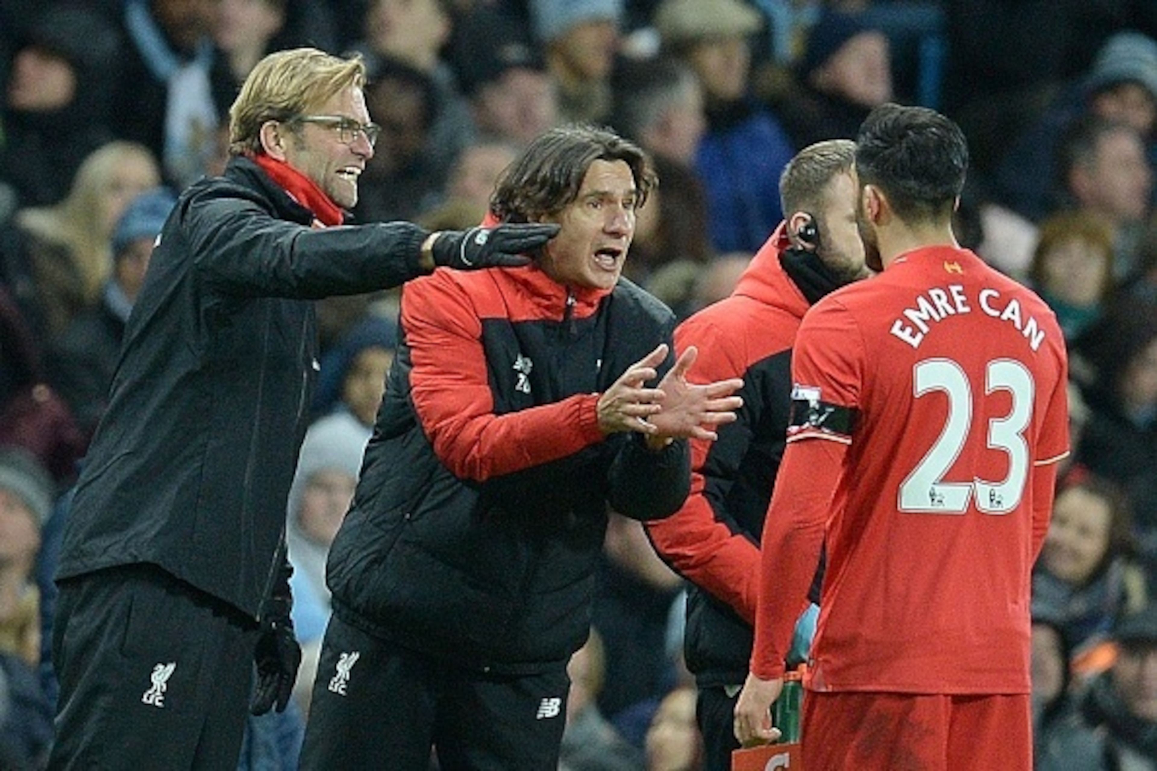 Liverpool's German manager Jurgen Klopp and Liverpool's Serbian assistant manager Zeljko Buvac (2nd L) talk to Liverpool's German midfielder Emre Can during the English Premier League football match between Manchester City and Liverpool at The Etihad stad