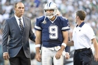 Sep 20, 2015; Philadelphia, PA, USA; Dallas Cowboys quarterback Tony Romo (9) is helped off the field after being sacked against the Philadelphia Eagles during the third quarter at Lincoln Financial Field. Mandatory Credit: Eric Hartline-USA TODAY Sports