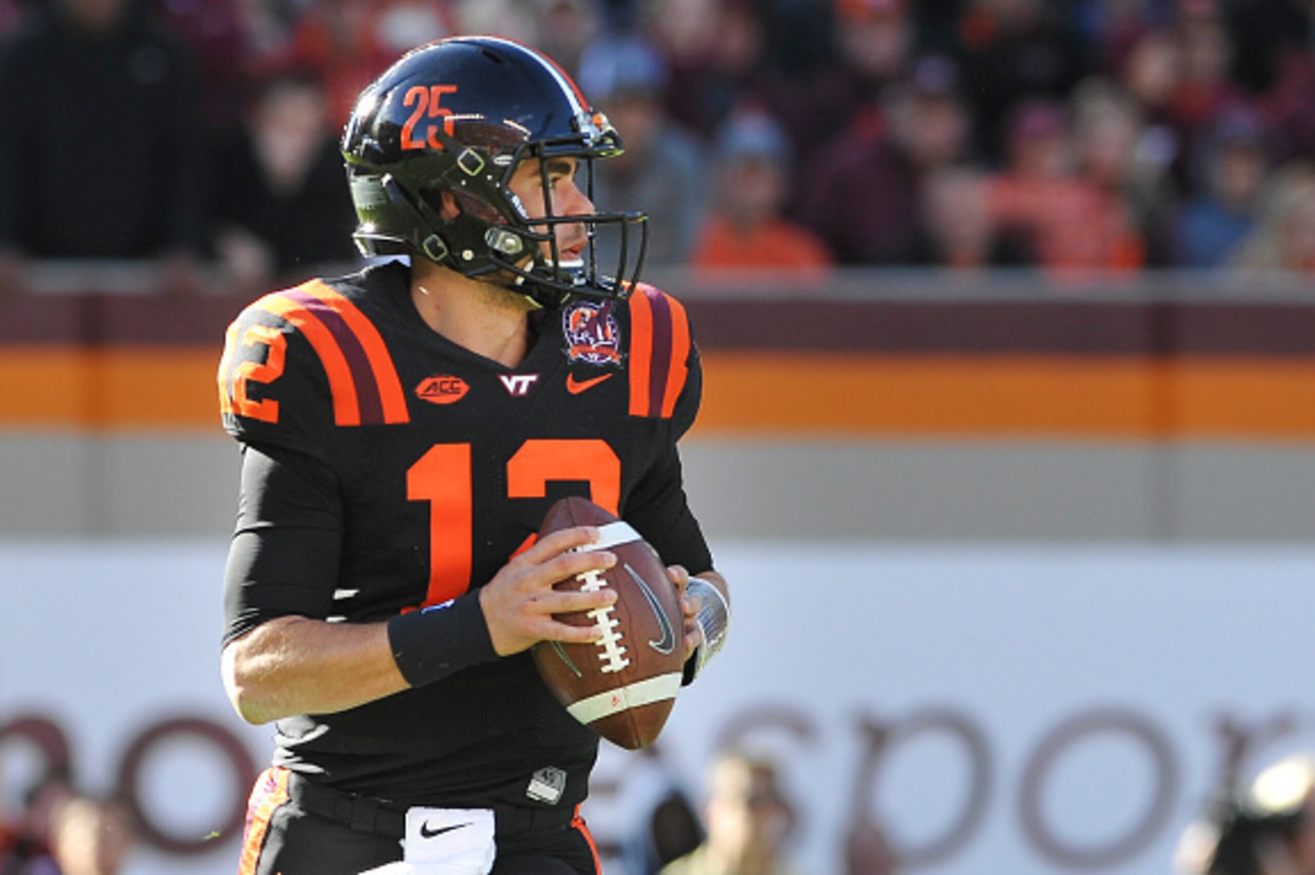 BLACKSBURG, VA - NOVEMBER 21: Quarterback Michael Brewer #12 of the Virginia Tech Hokies looks to pass against the North Carolina Tar Heels in the second half on November 21, 2015 in Blacksburg, Virginia. (Photo by Michael Shroyer/Getty Images) BLACKSBURG, VA - NOVEMBER 21: Quarterback Michael Brewer #12 of the Virginia Tech Hokies looks to pass against the North Carolina Tar Heels in the second half on November 21, 2015 in Blacksburg, Virginia. (Photo by Michael Shroyer/Getty Images)