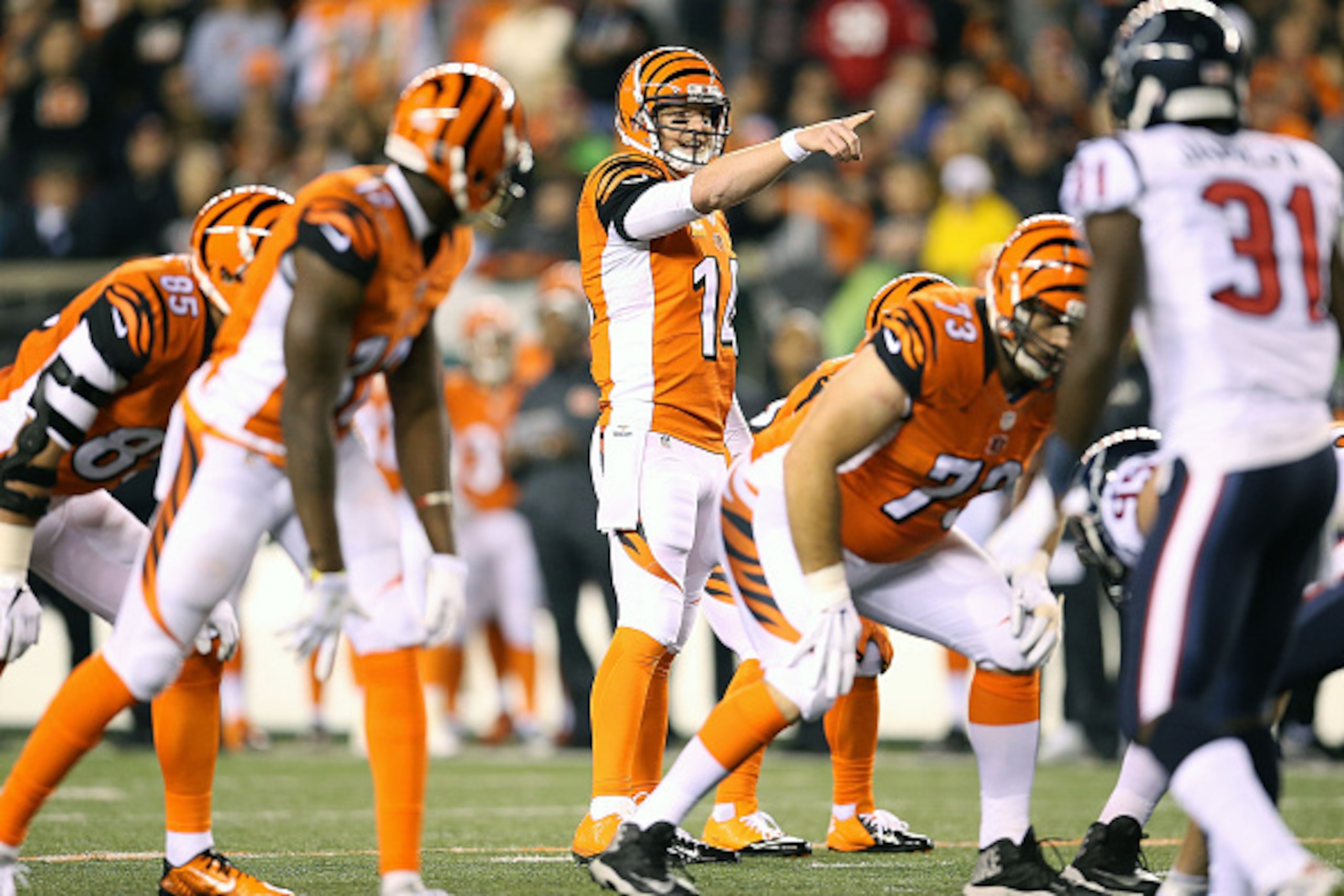 CINCINNATI, OH - NOVEMBER 16: Andy Dalton #14 of the Cincinnati Bengals calls a play at the line of scrimmage during the first quarter of the game against the Houston Texans at Paul Brown Stadium on November 16, 2015 in Cincinnati, Ohio. (Photo by Andy L CINCINNATI, OH - NOVEMBER 16: Andy Dalton #14 of the Cincinnati Bengals calls a play at the line of scrimmage during the first quarter of the game against the Houston Texans at Paul Brown Stadium on November 16, 2015 in Cincinnati, Ohio. (Photo by Andy L