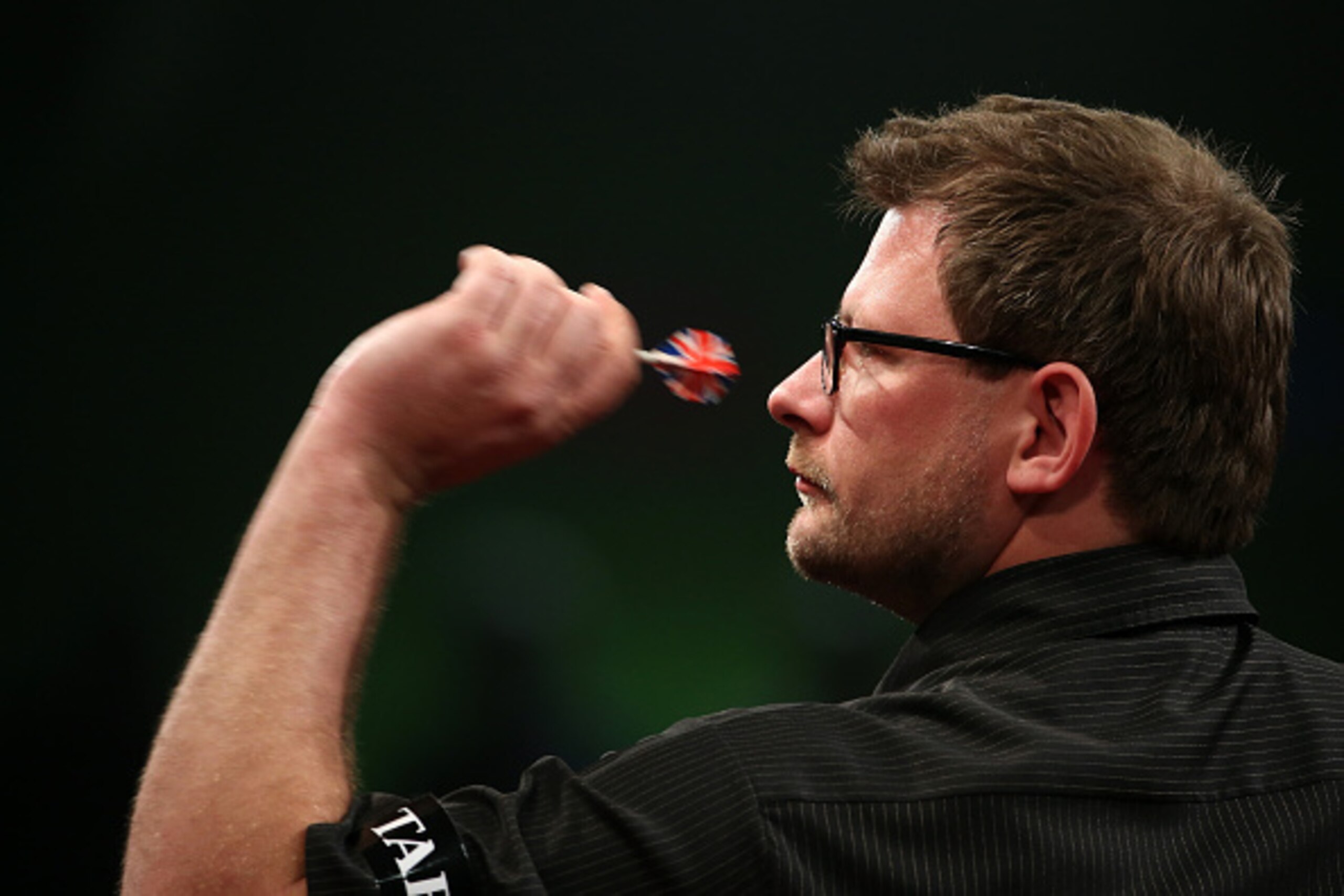 AUCKLAND, NEW ZEALAND - AUGUST 28: James Wade of Aldershot, England in action during the Auckland Darts Masters at The Trusts Arena on August 28, 2015 in Auckland, New Zealand. (Photo by Fiona Goodall/Getty Images) AUCKLAND, NEW ZEALAND - AUGUST 28: James Wade of Aldershot, England in action during the Auckland Darts Masters at The Trusts Arena on August 28, 2015 in Auckland, New Zealand. (Photo by Fiona Goodall/Getty Images)