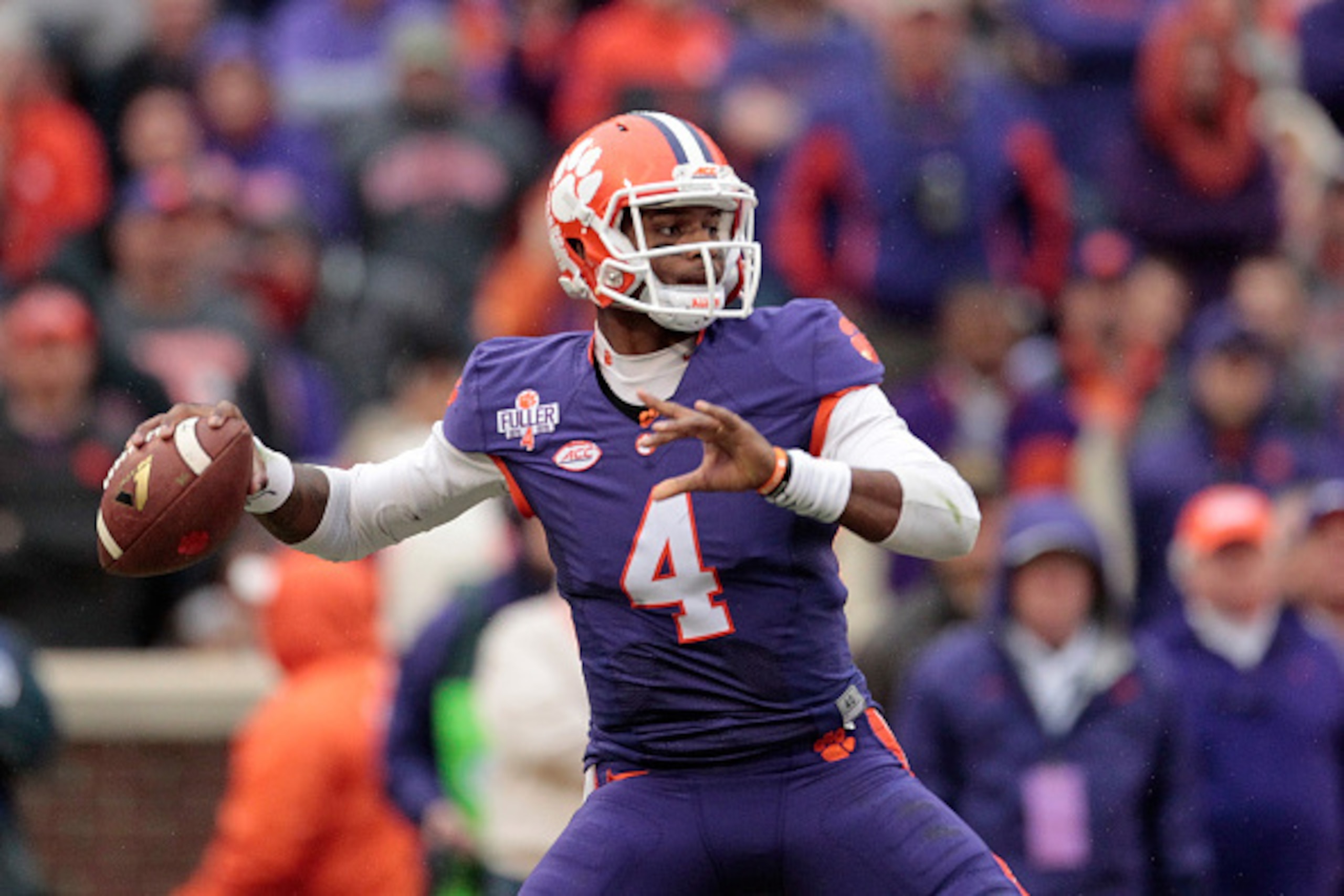 CLEMSON, SC - NOVEMBER 21: Deshaun Watson #4 of the Clemson Tigers drops back for a pass during their game against the Wake Forest Deamon Deacons at Memorial Stadium on November 21, 2015 in Clemson, South Carolina. (Photo by Tyler Smith/Getty Images)