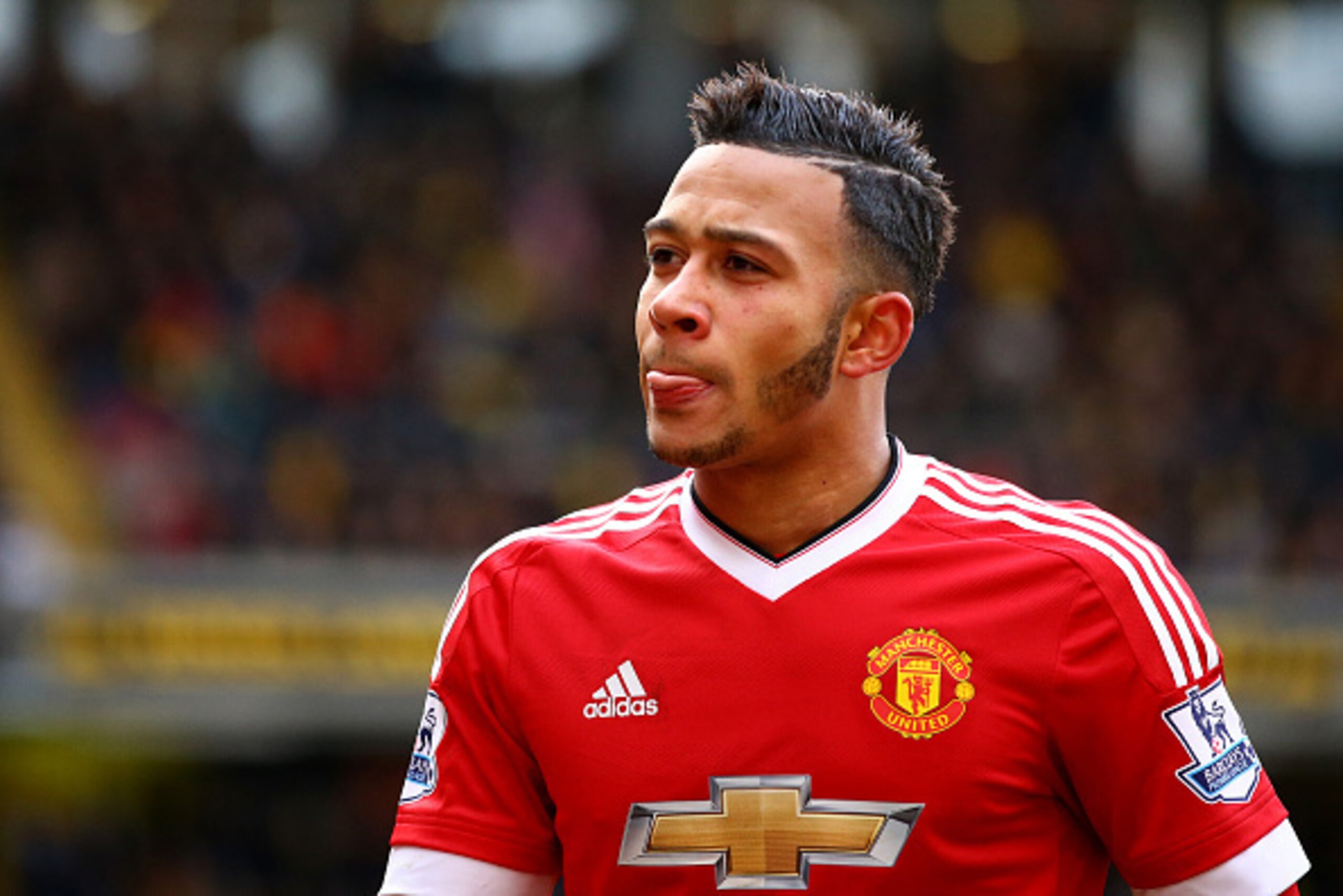 WATFORD, ENGLAND - NOVEMBER 21: Memphis Depay of Manchester United in action during the Barclays Premier League match between Watford and Manchester United at Vicarage Road on November 21, 2015 in Watford, England. (Photo by Richard Heathcote/Getty Imag WATFORD, ENGLAND - NOVEMBER 21: Memphis Depay of Manchester United in action during the Barclays Premier League match between Watford and Manchester United at Vicarage Road on November 21, 2015 in Watford, England. (Photo by Richard Heathcote/Getty Imag