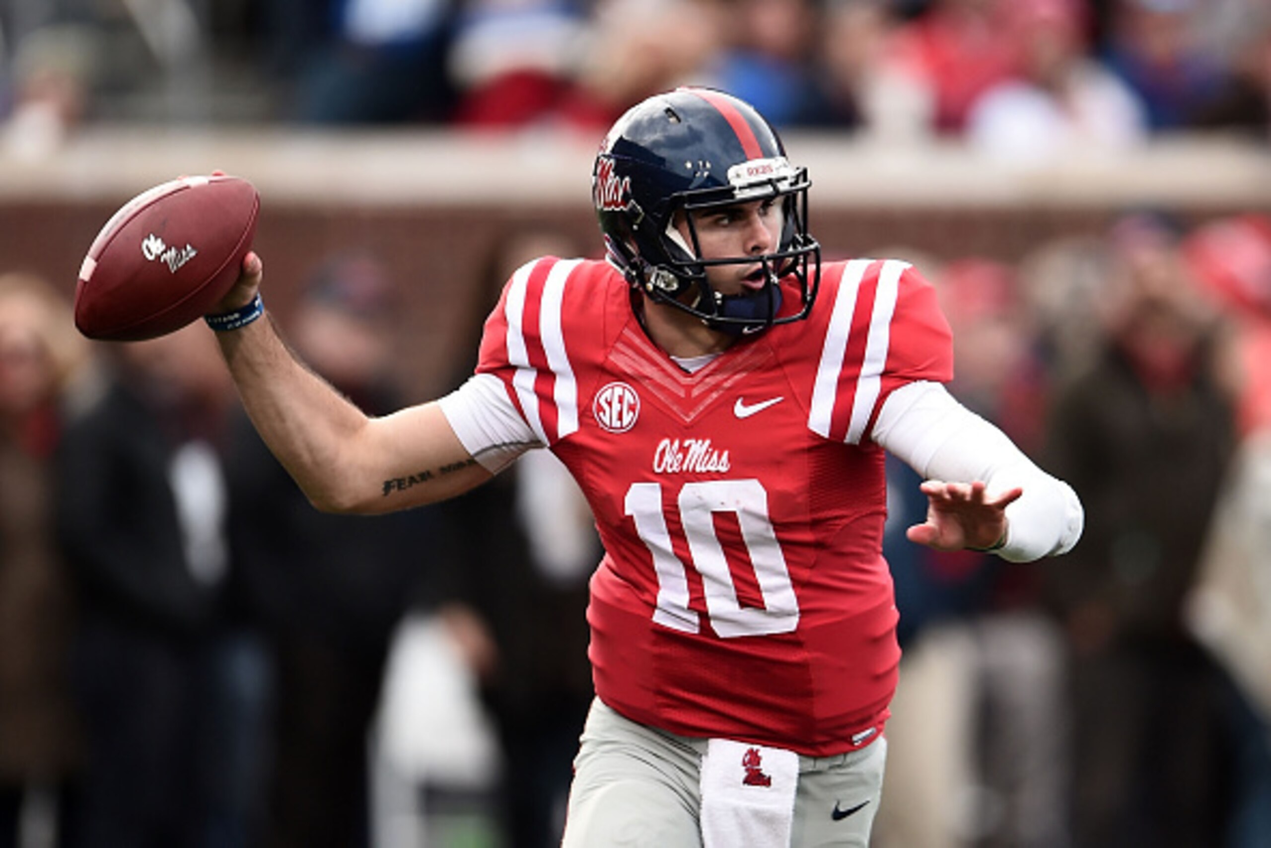 OXFORD, MS - NOVEMBER 21:  Chad Kelly #10 of the Mississippi Rebels looks to pass during the first quarter of a game against the LSU Tigers at Vaught-Hemingway Stadium on November 21, 2015 in Oxford, Mississippi.  (Photo by Stacy Revere/Getty Images)