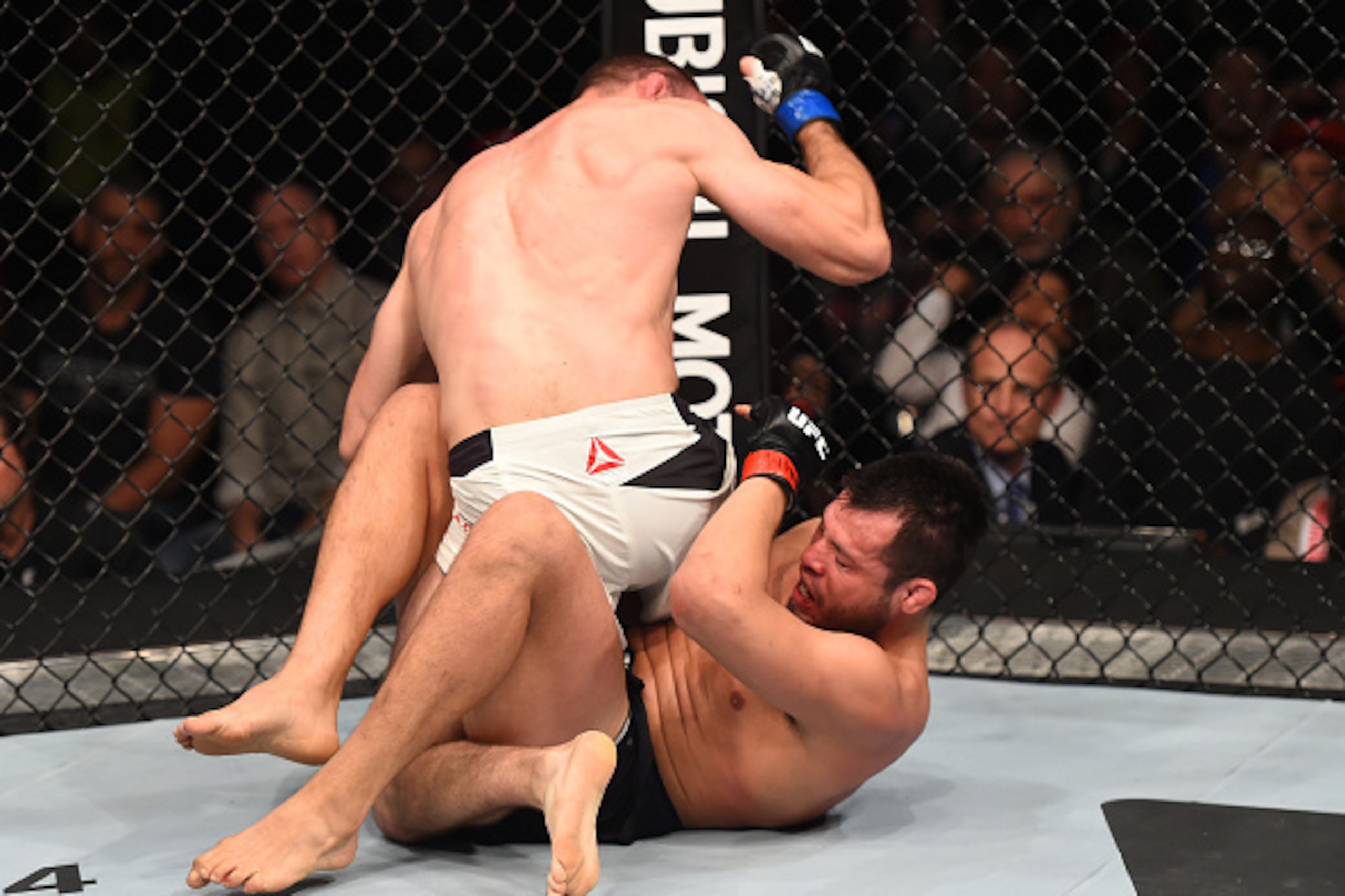MONTERREY, MEXICO - NOVEMBER 21:  (L-R) Bartosz Fabinski of Poland elbows Hector Urbina of Mexico in their welterweight bout during the UFC Fight Night event at Arena Monterrey on November 21, 2015 in Monterrey, Mexico.  (Photo by Jeff Bottari/Zuffa LLC/Z