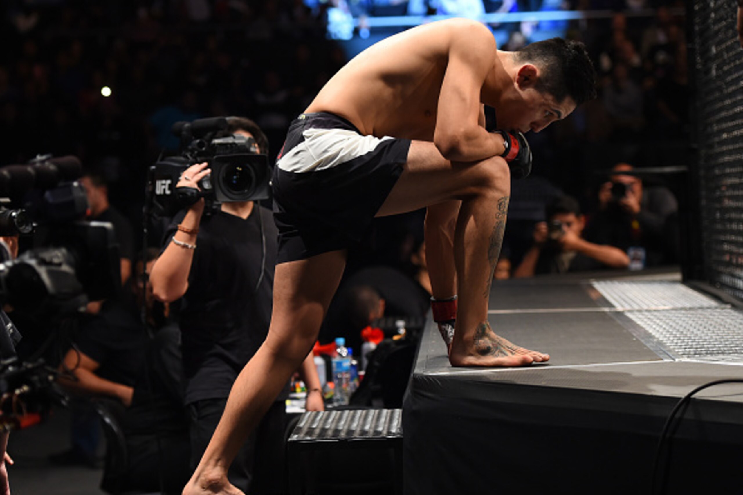MONTERREY, MEXICO - NOVEMBER 21:  Erik Perez of Mexico prepares to enter the Octagon before his bantamweight bout against Taylor Lapilus of France during the UFC Fight Night event at Arena Monterrey on November 21, 2015 in Monterrey, Mexico.  (Photo by Je
