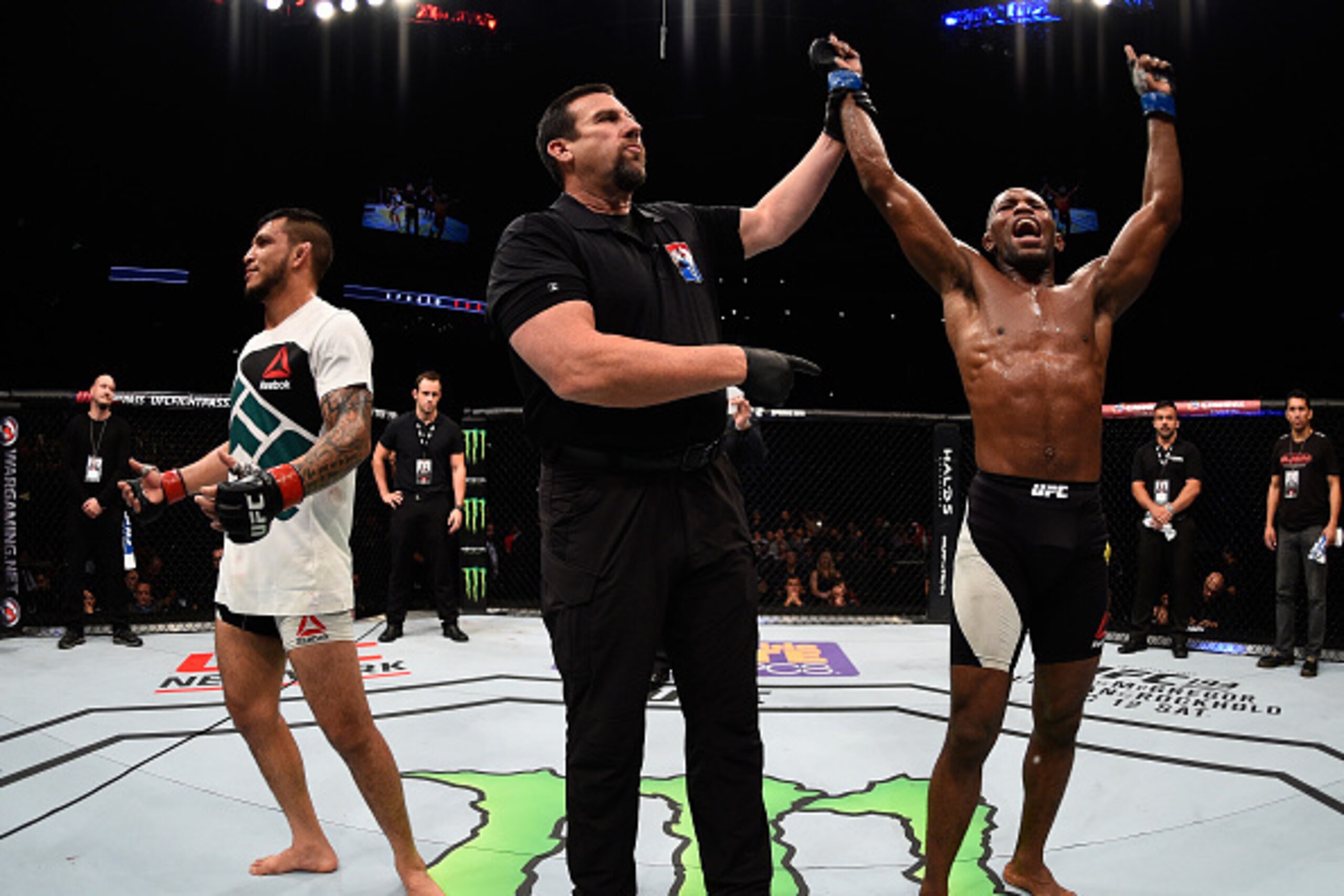 MONTERREY, MEXICO - NOVEMBER 21:  Leandro Silva of Brazil celebrates after his decision victory over Efrain Escudero of Mexico in their lightweight bout during the UFC Fight Night event at Arena Monterrey on November 21, 2015 in Monterrey, Mexico.  (Photo