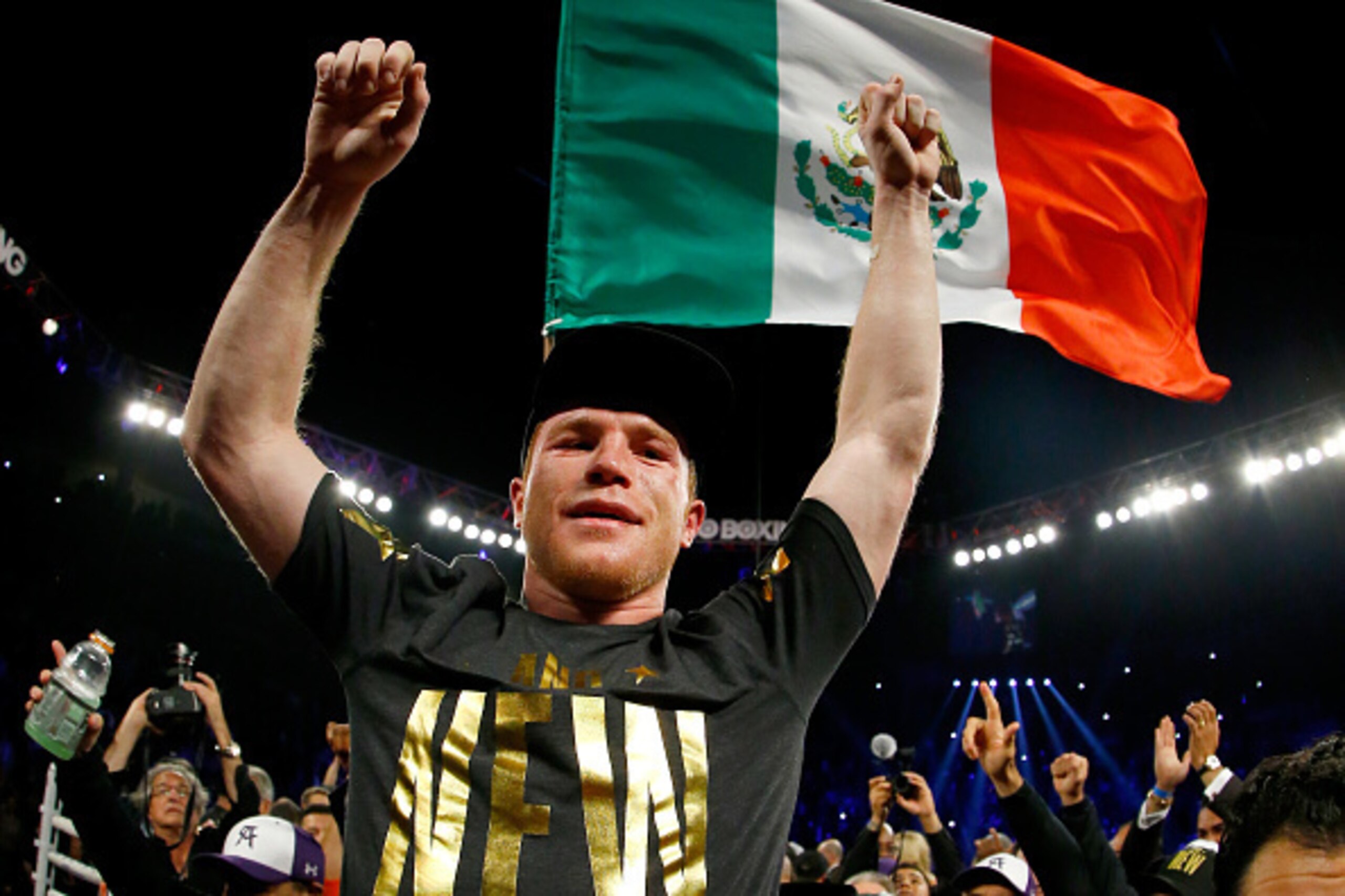 LAS VEGAS, NV - NOVEMBER 21: Canelo Alvarez celebrates after defeating Miguel Cotto by unanimous decision in their middleweight fight at the Mandalay Bay Events Center on November 21, 2015 in Las Vegas, Nevada. (Photo by Al Bello/Getty Images) LAS VEGAS, NV - NOVEMBER 21: Canelo Alvarez celebrates after defeating Miguel Cotto by unanimous decision in their middleweight fight at the Mandalay Bay Events Center on November 21, 2015 in Las Vegas, Nevada. (Photo by Al Bello/Getty Images)