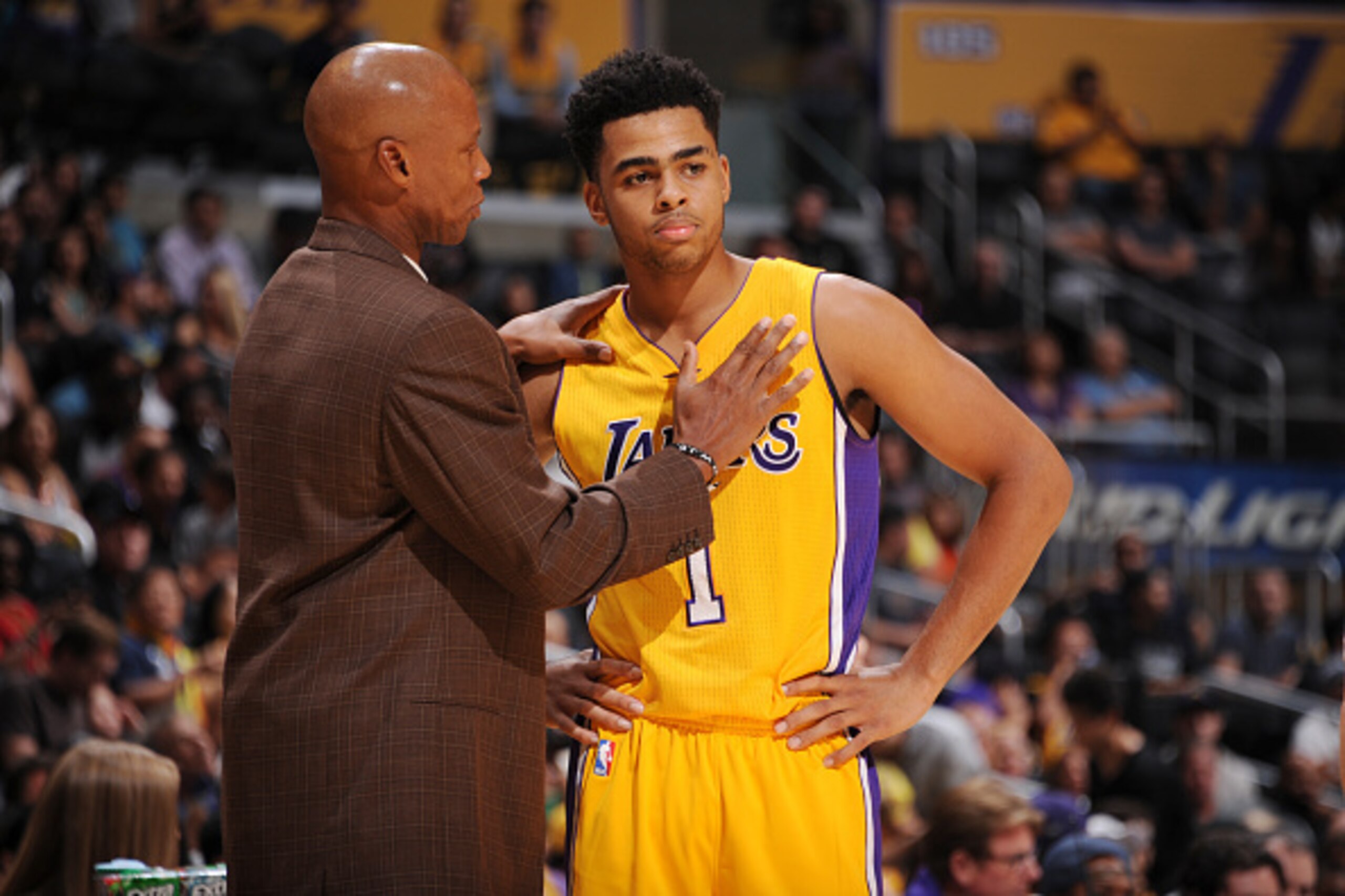 LOS ANGELES, CA - OCTOBER 11: Head coach, Byron Scott of the Los Angeles Lakers speaks with D'Angelo Russell #1  during the preseason game against the Maccabi Haifa on October 11, 2015 at STAPLES CENTER in Los Angeles, California. NOTE TO USER: User expre