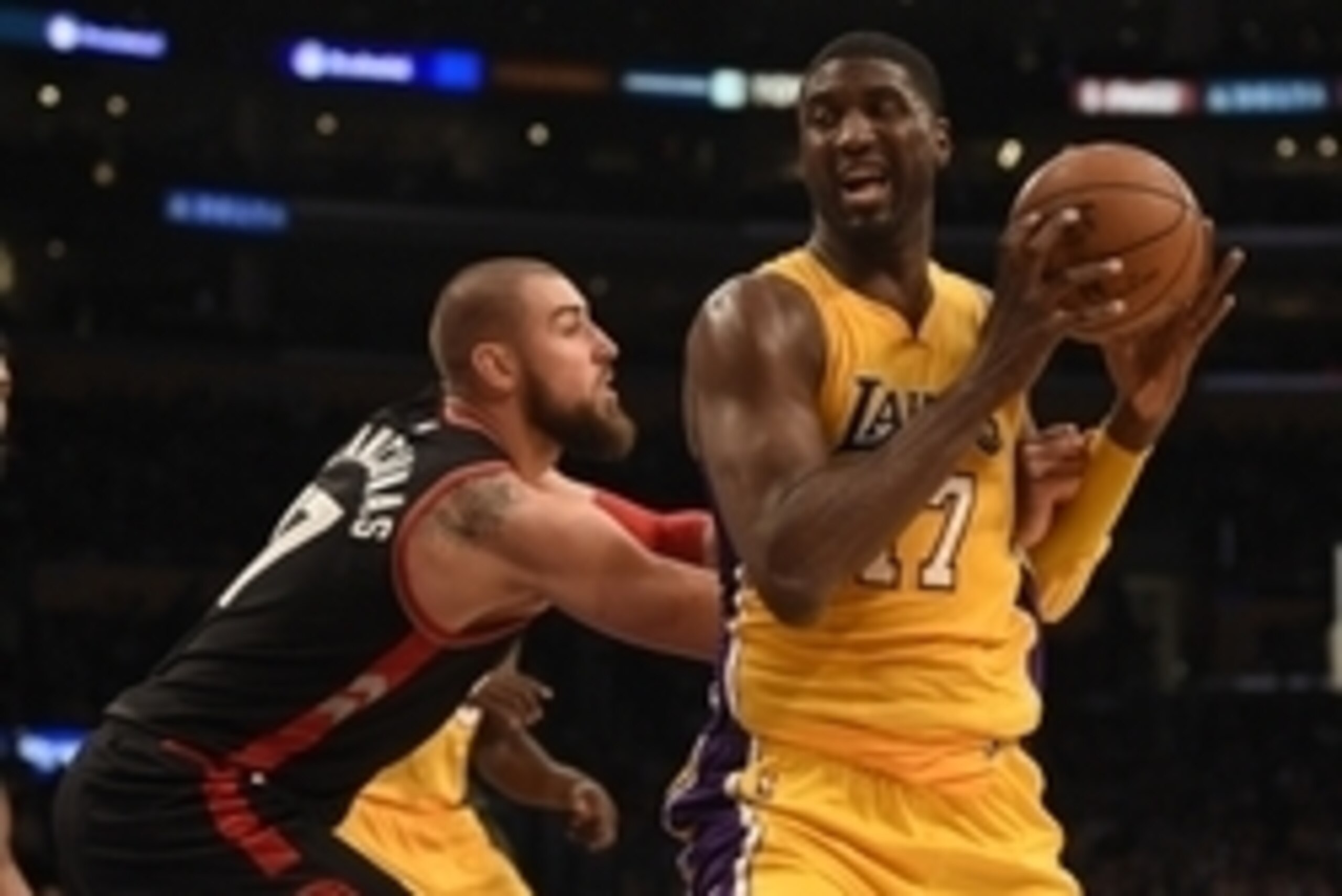 Nov 20, 2015; Los Angeles, CA, USA; Los Angeles Lakers center Roy Hibbert (right) posts up on Toronto Raptors center Jonas Valanciunas (left) during the second quarter at Staples Center. Mandatory Credit: Kelvin Kuo-USA TODAY Sports
