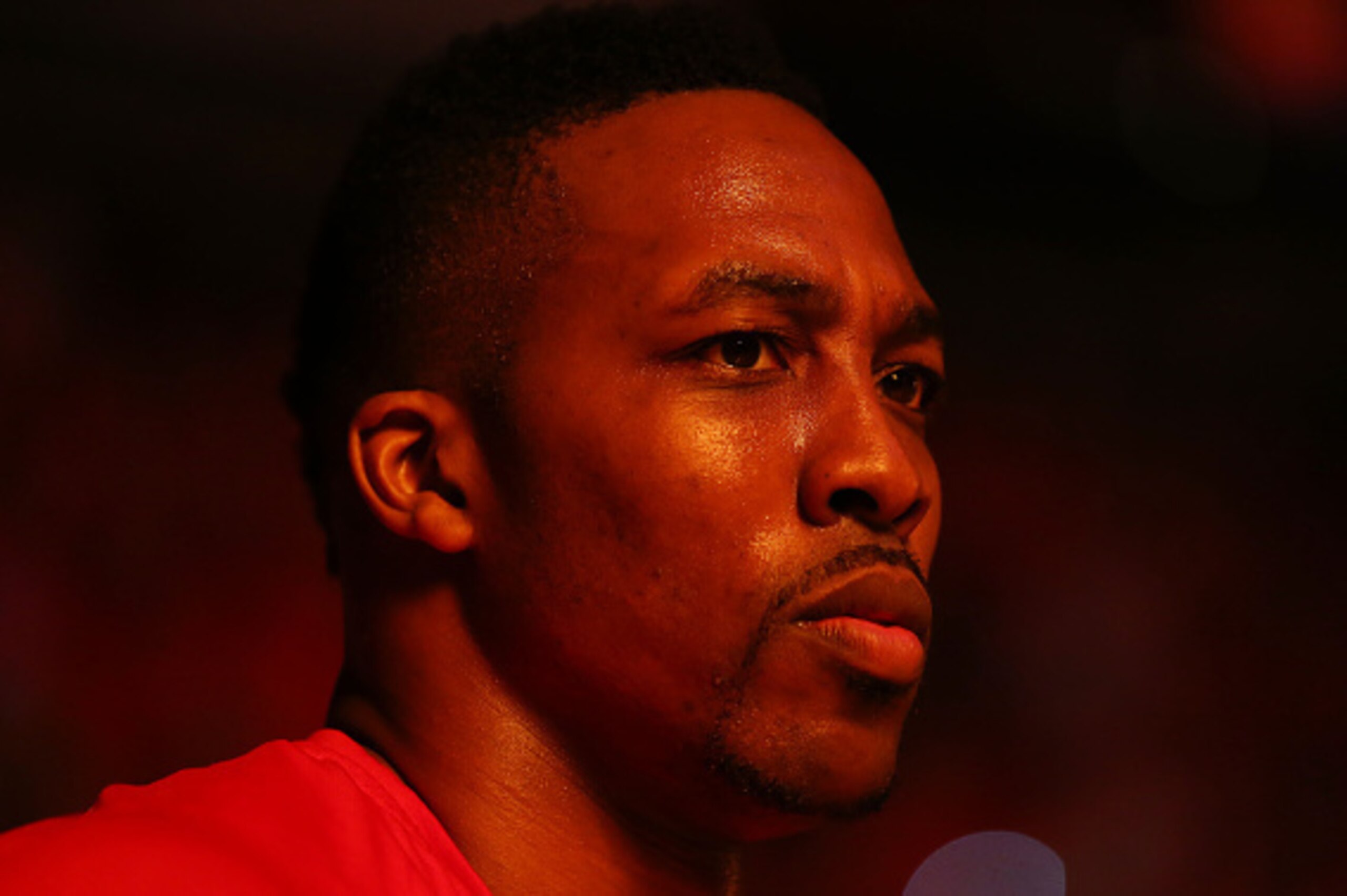 HOUSTON, TX - MAY 25: Dwight Howard #12 of the Houston Rockets looks on during pregame ceremonies for Game Four of the Western Conference Finals of the 2015 NBA PLayoffs against the Golden State Warriors at Toyota Center on May 25, 2015 in Houston, Texas HOUSTON, TX - MAY 25: Dwight Howard #12 of the Houston Rockets looks on during pregame ceremonies for Game Four of the Western Conference Finals of the 2015 NBA PLayoffs against the Golden State Warriors at Toyota Center on May 25, 2015 in Houston, Texas