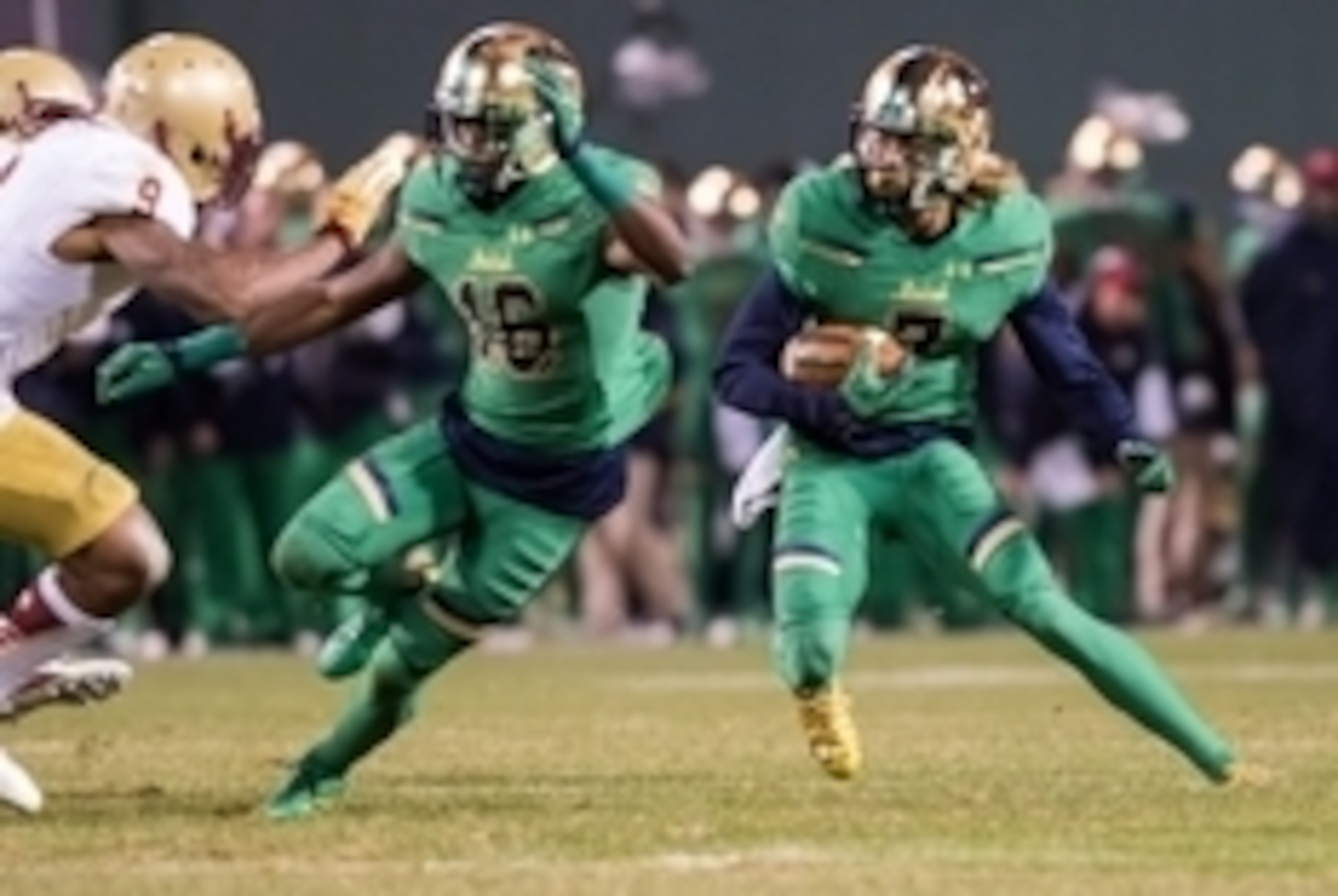Nov 21, 2015; Boston, MA, USA; Notre Dame Fighting Irish wide receiver William Fuller (7) runs after the catch while wide receiver Torii Hunter Jr. (16) blocks as Boston College Eagles defensive back John Johnson (9) defends in the third quarter at Fenway Nov 21, 2015; Boston, MA, USA; Notre Dame Fighting Irish wide receiver William Fuller (7) runs after the catch while wide receiver Torii Hunter Jr. (16) blocks as Boston College Eagles defensive back John Johnson (9) defends in the third quarter at Fenway