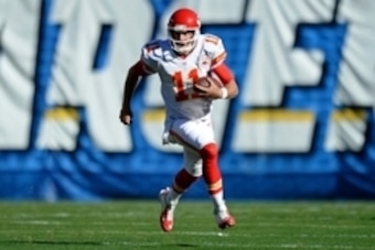 Nov 22, 2015; San Diego, CA, USA; Kansas City Chiefs quarterback Alex Smith (11) runs during the second quarter against the San Diego Chargers at Qualcomm Stadium. Mandatory Credit: Jake Roth-USA TODAY Sports
