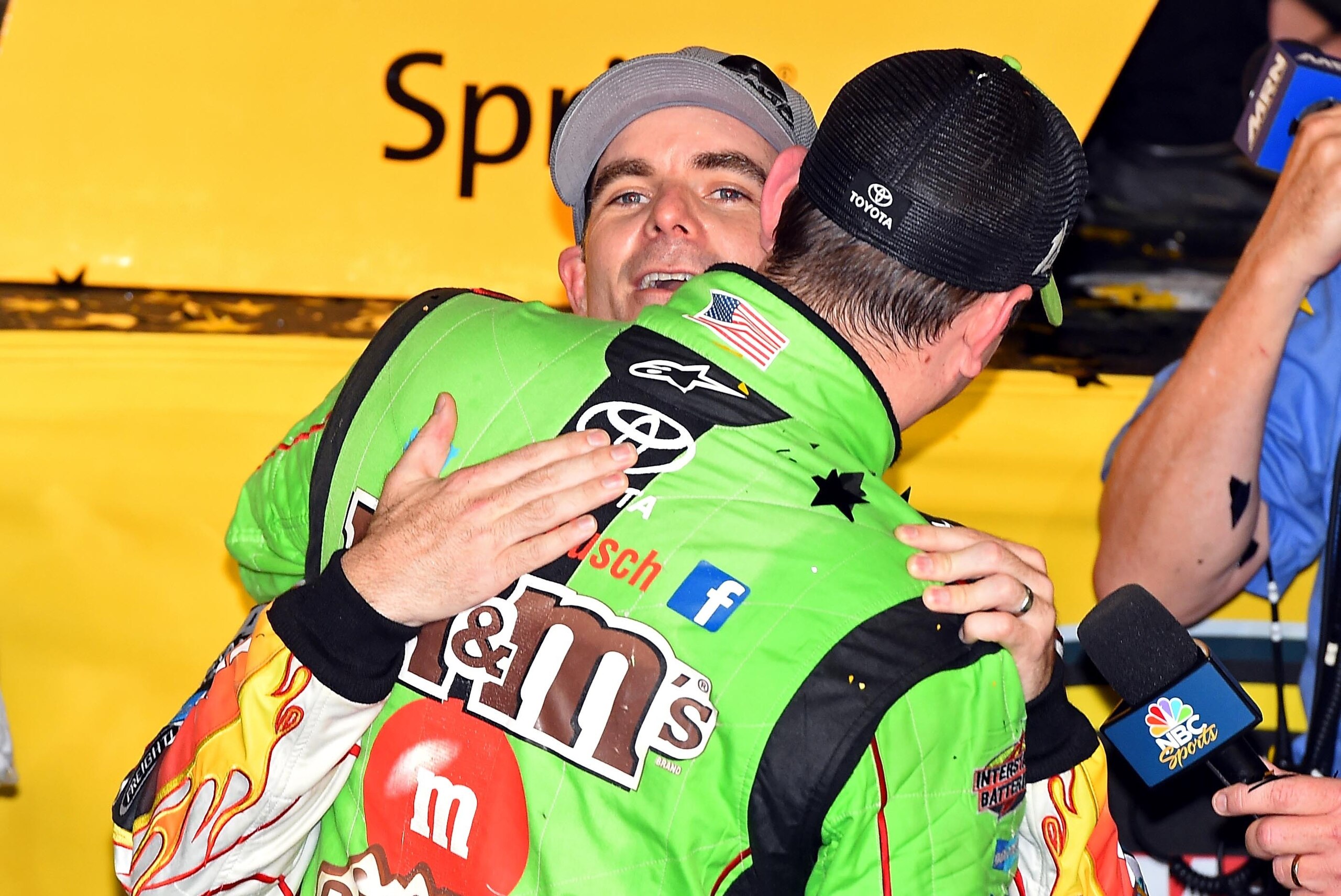 Nov 22, 2015; Homestead, FL, USA; Sprint Cup Series driver Jeff Gordon (24) congratulates Sprint Cup Series driver Kyle Busch (18) after he won the NASCAR Spring Cup Championship after the Ford EcoBoost 400 at Homestead-Miami Speedway. Mandatory Credit: J