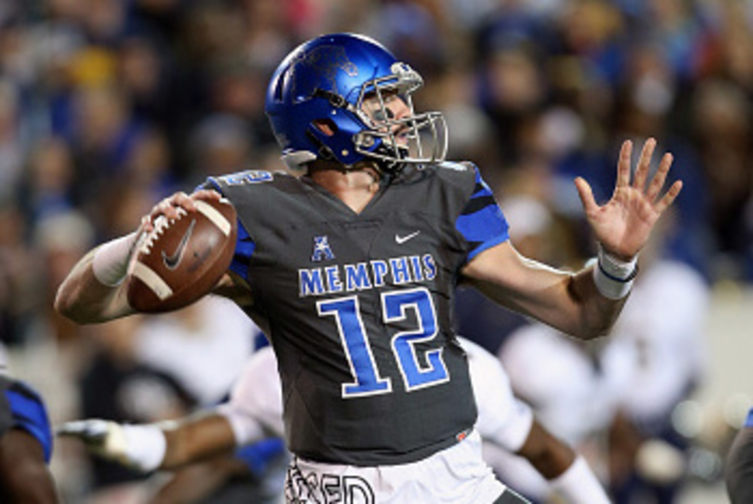 MEMPHIS, TN - NOVEMBER 7: Paxton Lynch #12 of the Memphis Tigers throws downfield against the Navy Midshipmen on November 7, 2015 at Liberty Bowl Memorial Stadium in Memphis, Tennessee. Navy defeated Memphis 45-20. (Photo by Joe Murphy/Getty Images)