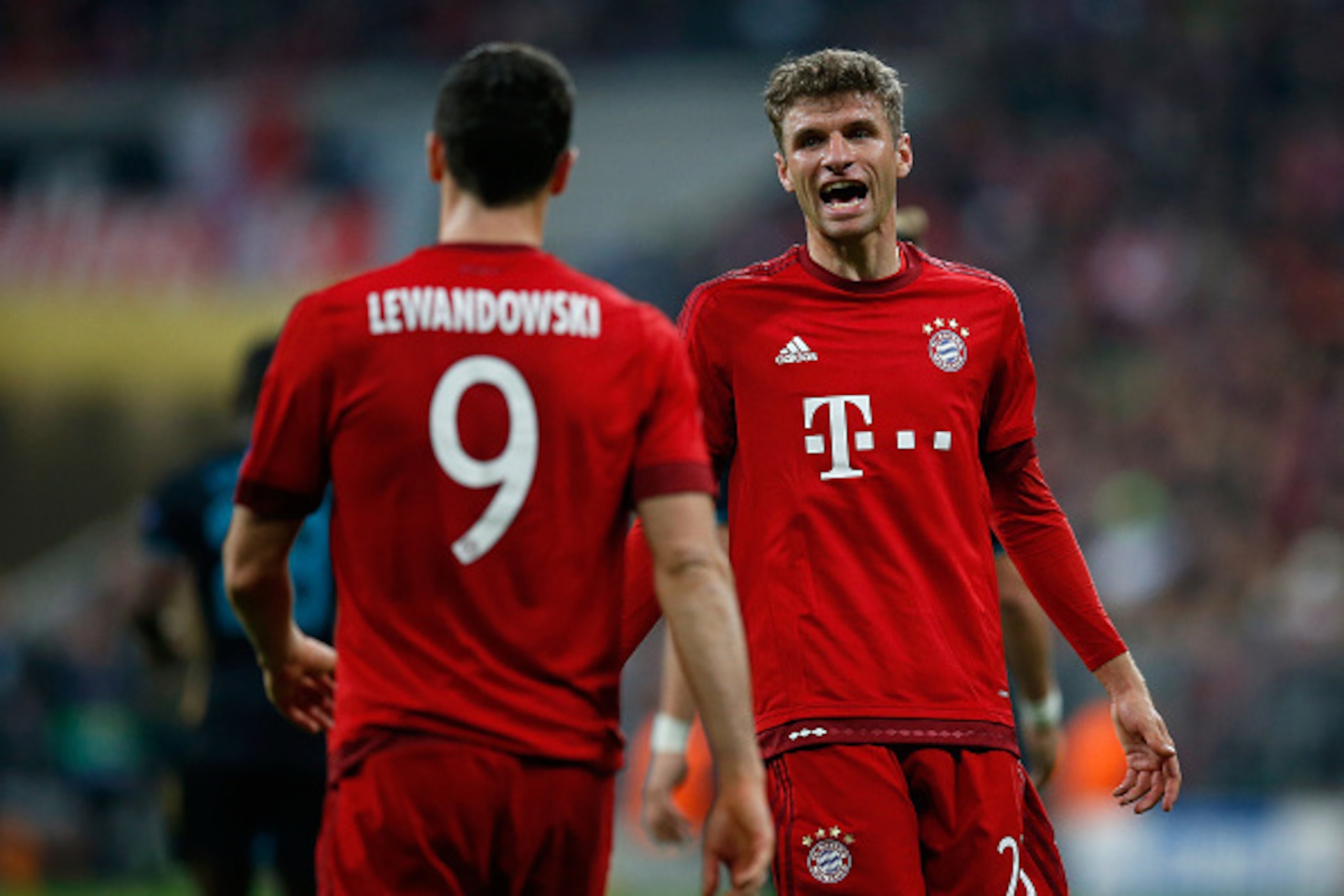 MUNICH, GERMANY - NOVEMBER 04:  Thomas Mueller of Bayern Muenchen reacts with Robert Lewandowski (L) during the UEFA Champions League Group F match between FC Bayern Muenchen and Arsenal FC at Allianz Arena on November 4, 2015 in Munich, Germany.  (Photo 