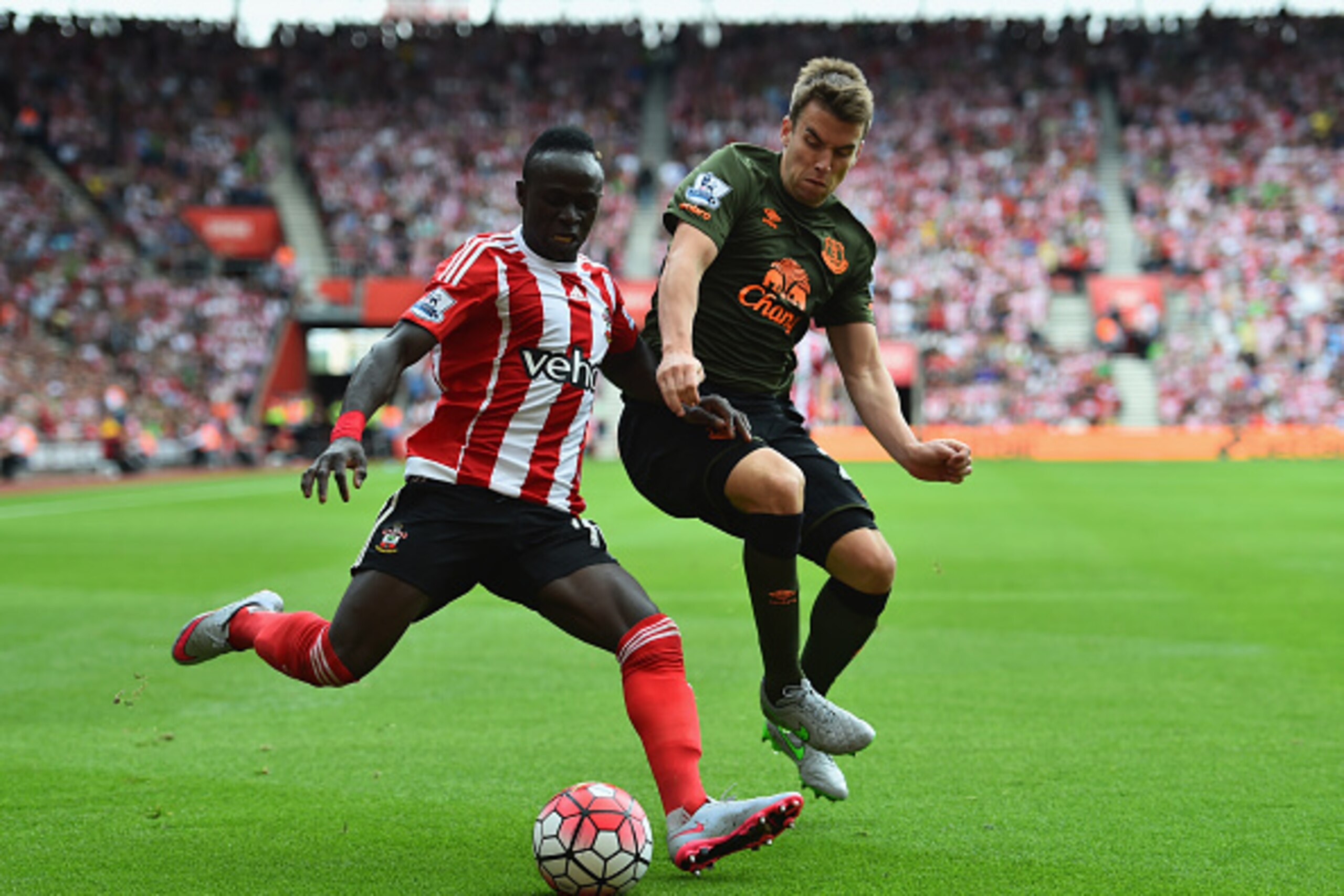 SOUTHAMPTON, ENGLAND - AUGUST 15: Sadio Mane of Southampton and Seamus Coleman of Everton compete for the ball during the Barclays Premier League match between Southampton and Everton at St Mary's Stadium on August 15, 2015 in Southampton, United Kingdom. SOUTHAMPTON, ENGLAND - AUGUST 15: Sadio Mane of Southampton and Seamus Coleman of Everton compete for the ball during the Barclays Premier League match between Southampton and Everton at St Mary's Stadium on August 15, 2015 in Southampton, United Kingdom.