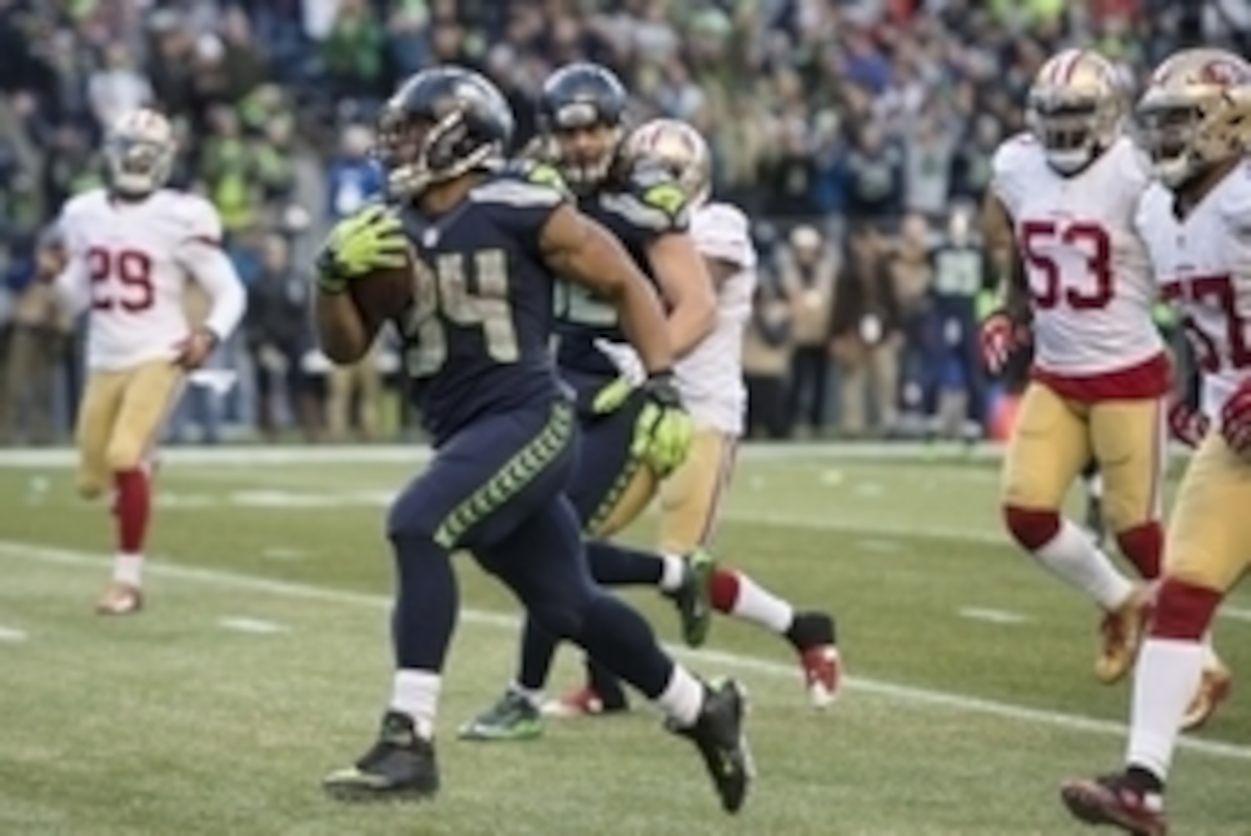 Nov 22, 2015; Seattle, WA, USA; Seattle Seahawks running back Thomas Rawls (34) scores a touchdown during the fourth quarter in a game against the San Francisco 49ers at CenturyLink Field. The Seahawks won 29-13. Mandatory Credit: Troy Wayrynen-USA TODAY 