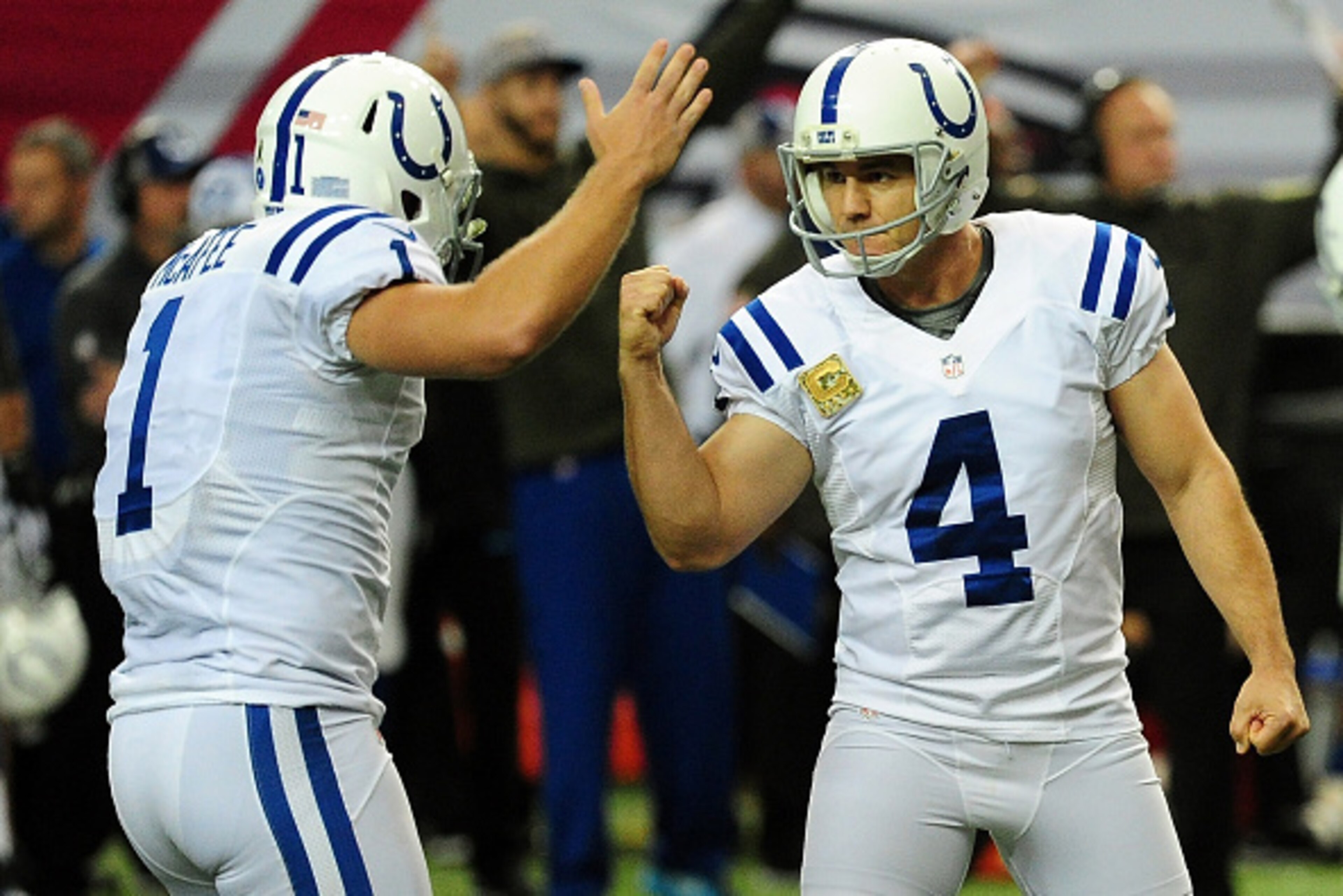 ATLANTA, GA - NOVEMBER 22: Adam Vinatieri #4 celebrates with Pat McAfee #1 of the Indianapolis Colts after kicking the game winning field goal during the second half against the Atlanta Falcons at the Georgia Dome on November 22, 2015 in Atlanta, Georgia.