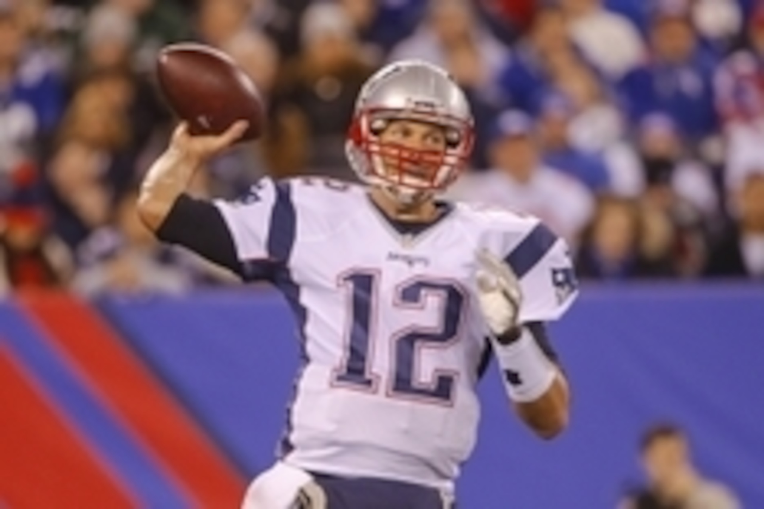 Nov 15, 2015; East Rutherford, NJ, USA;  New England Patriots quarterback Tom Brady (12) throws a pass during the second quarter against the New York Giants at MetLife Stadium. Mandatory Credit: Jim O'Connor-USA TODAY Sports
