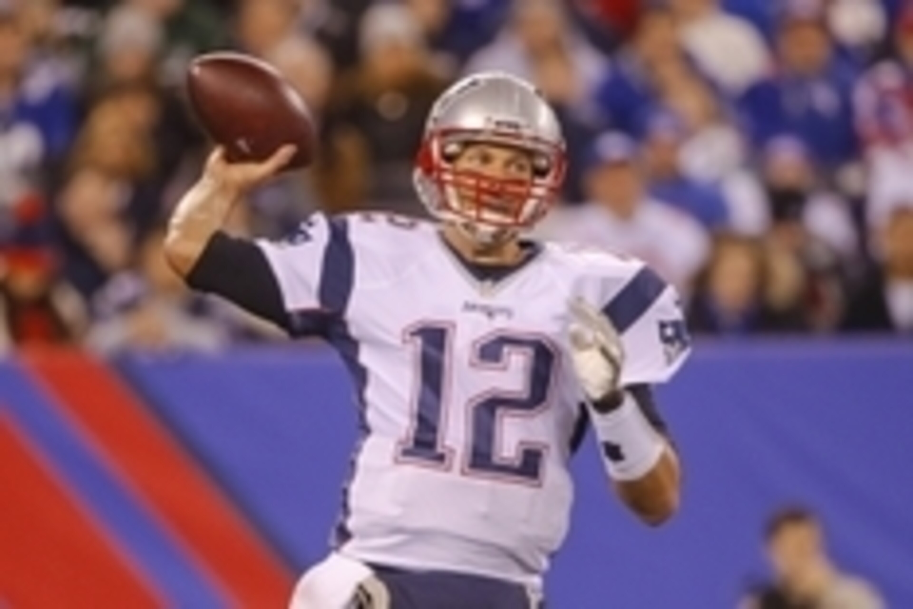 Nov 15, 2015; East Rutherford, NJ, USA;  New England Patriots quarterback Tom Brady (12) throws a pass during the second quarter against the New York Giants at MetLife Stadium. Mandatory Credit: Jim O'Connor-USA TODAY Sports