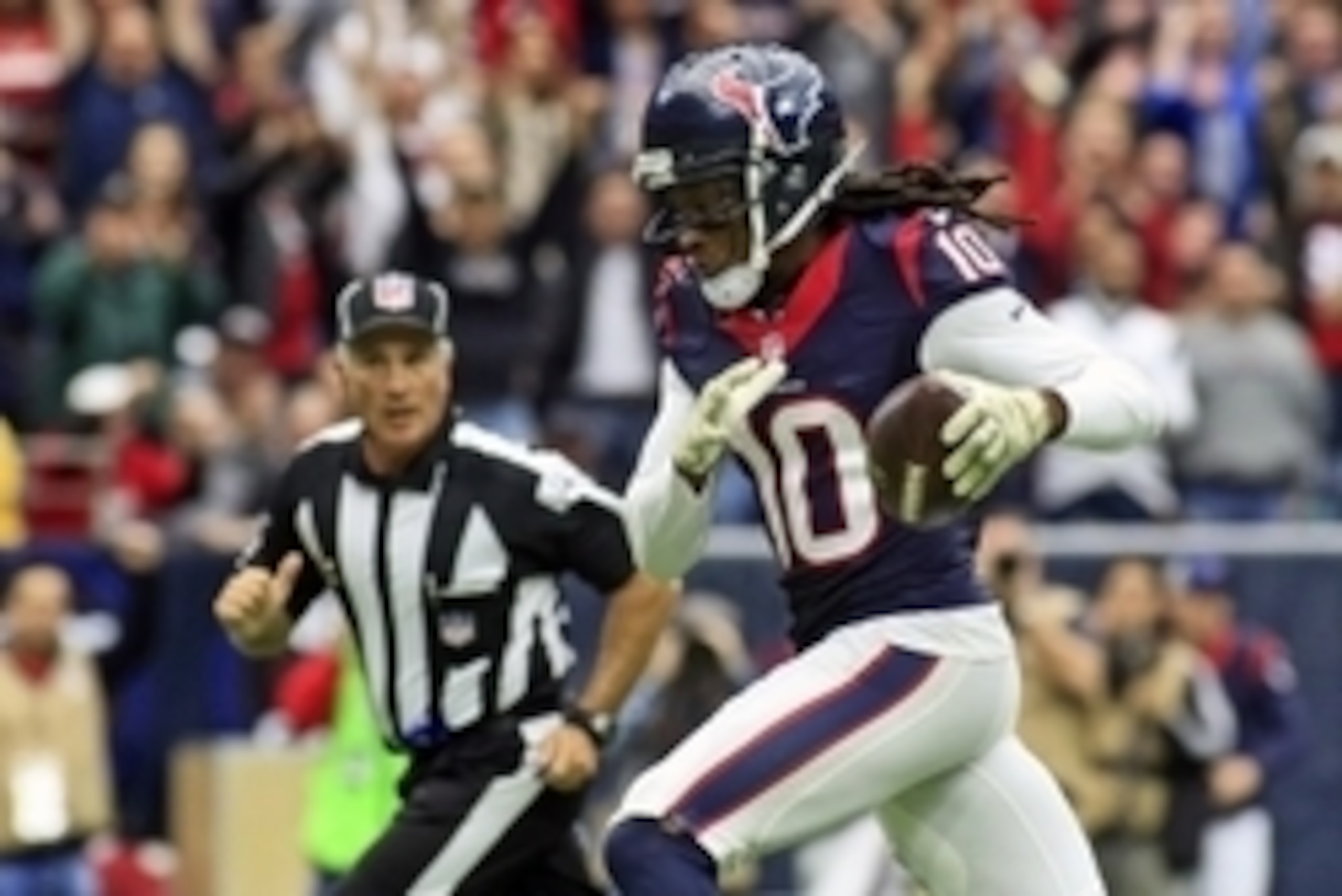 Nov 22, 2015; Houston, TX, USA; Houston Texans wide receiver DeAndre Hopkins (10) runs in for a touchdown against the New York Jets during the second quarter of a game at NRG Stadium. Mandatory Credit: Ray Carlin-USA TODAY Sports