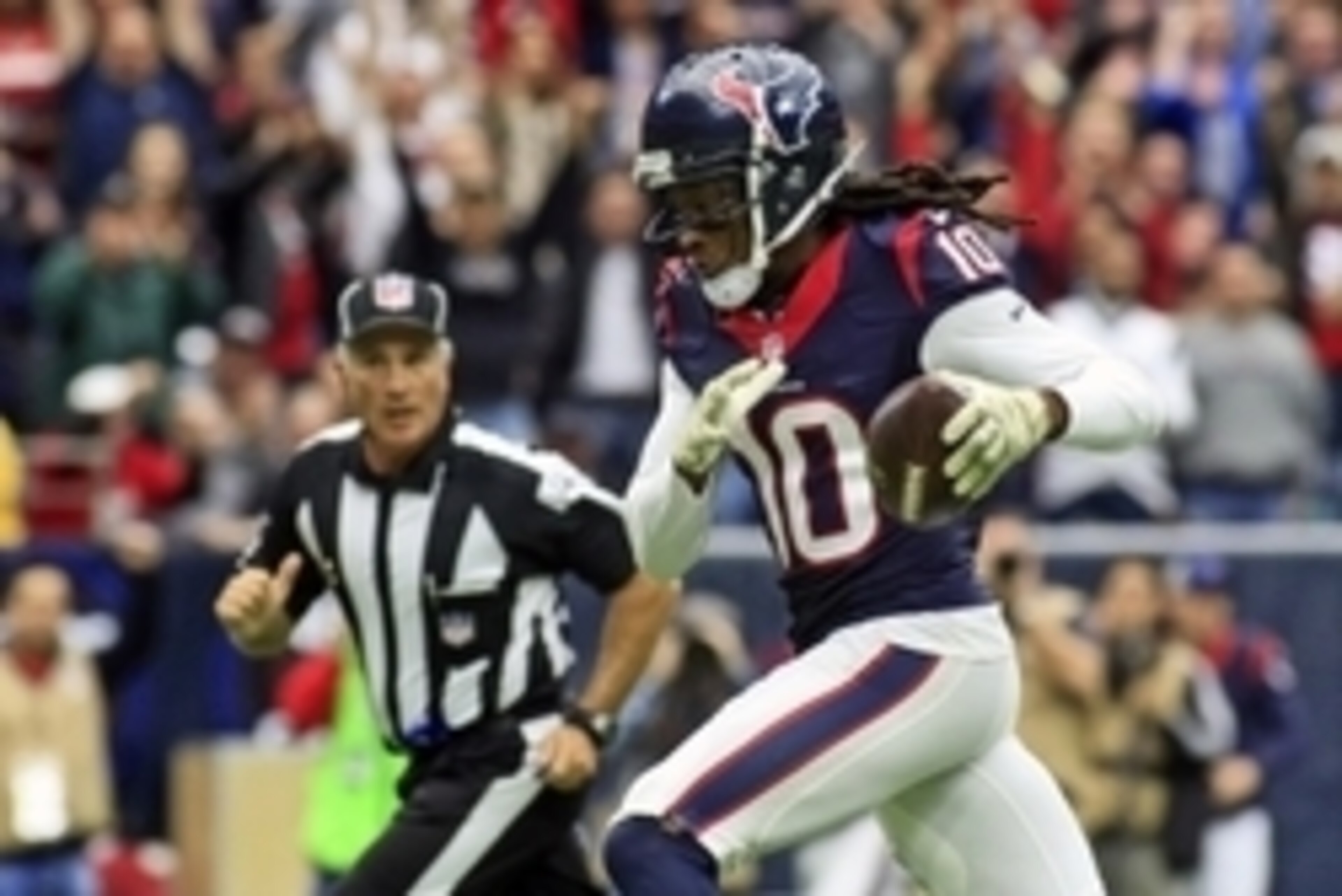 Nov 22, 2015; Houston, TX, USA; Houston Texans wide receiver DeAndre Hopkins (10) runs in for a touchdown against the New York Jets during the second quarter of a game at NRG Stadium. Mandatory Credit: Ray Carlin-USA TODAY Sports