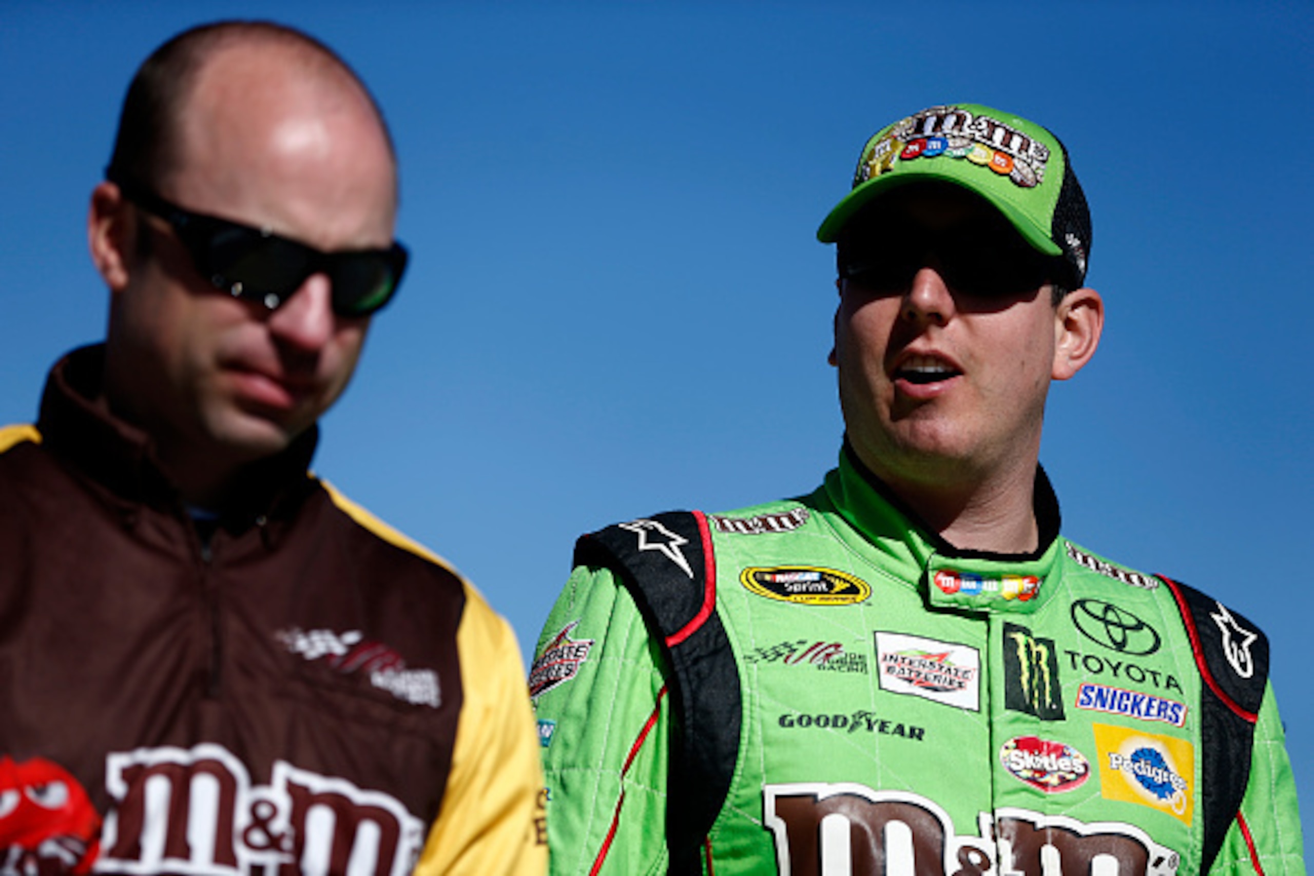 MARTINSVILLE, VA - OCTOBER 30:  Kyle Busch, driver of the #18 M&M's Crispy Toyota, talks with his crew chief Adam Stevens during practice for the NASCAR Camping World Truck Series Kroger 200 at Martinsville Speedway on October 30, 2015 in Martinsville, Vi
