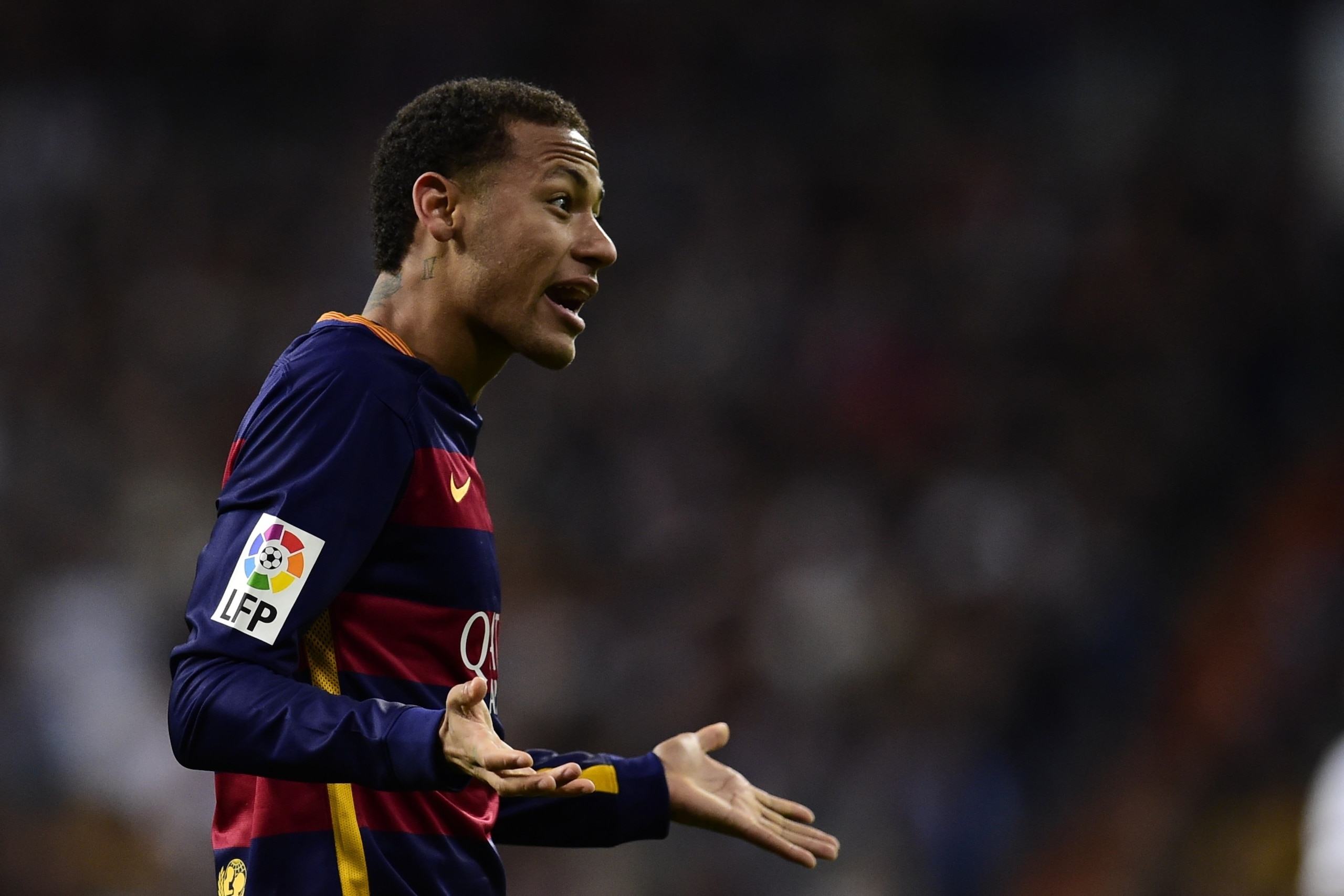 Barcelona's Brazilian forward Neymar gestures during the Spanish league 'Clasico' football match Real Madrid CF vs FC Barcelona at the Santiago Bernabeu stadium in Madrid on November 21, 2015. AFP PHOTO/ JAVIER SORIANO (Photo credit should read JAV Barcelona's Brazilian forward Neymar gestures during the Spanish league 'Clasico' football match Real Madrid CF vs FC Barcelona at the Santiago Bernabeu stadium in Madrid on November 21, 2015. AFP PHOTO/ JAVIER SORIANO (Photo credit should read JAV
