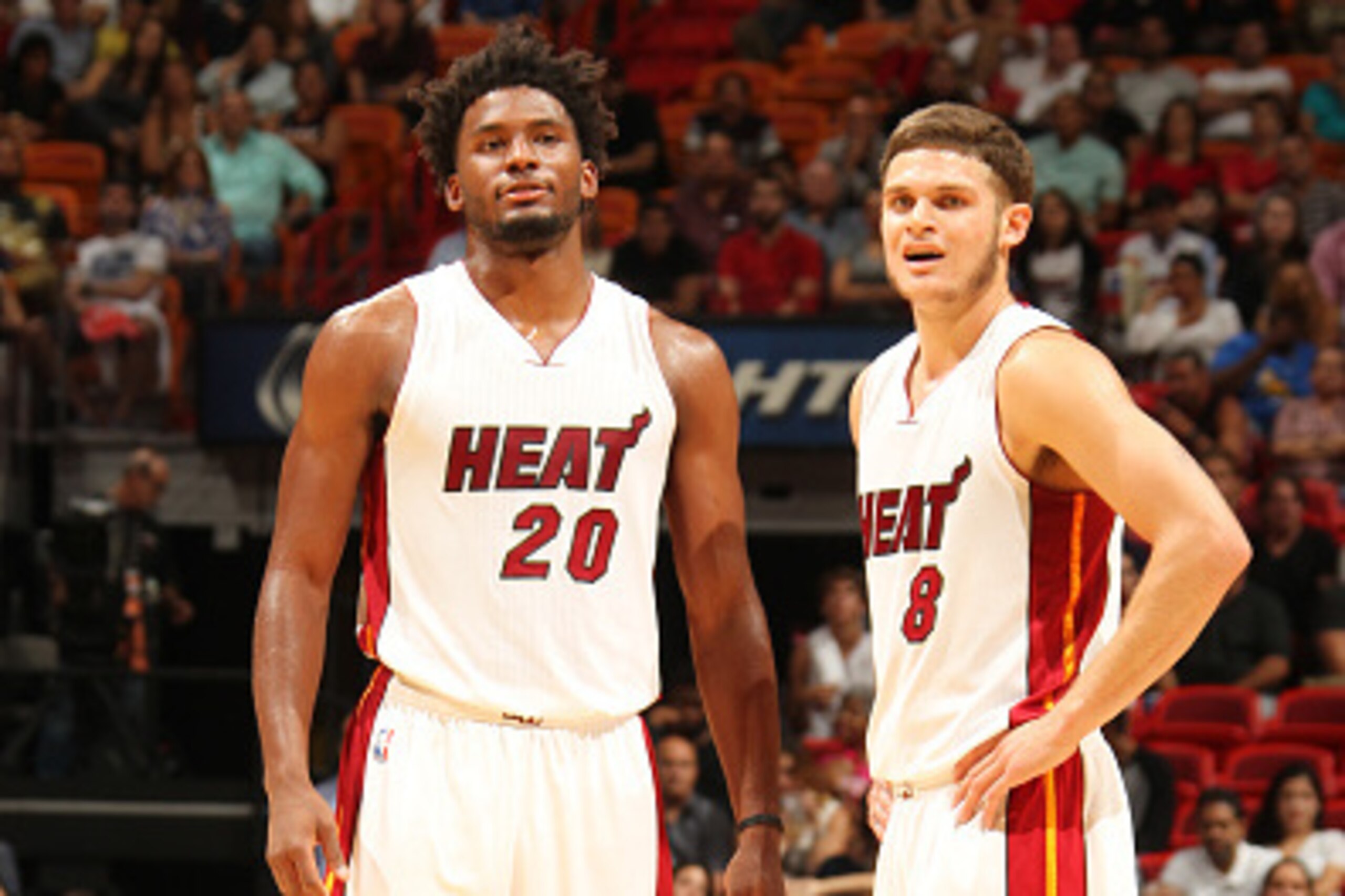 MIAMI, FL - OCTOBER 12: Justise Winslow #20 and Tyler Johnson #8 of the Miami Heat during a preseason game against the San Antonio Spurs on October 12, 2015 at AmericanAirlines Arena in Miami, Florida. NOTE TO USER:  User expressly acknowledges and agrees