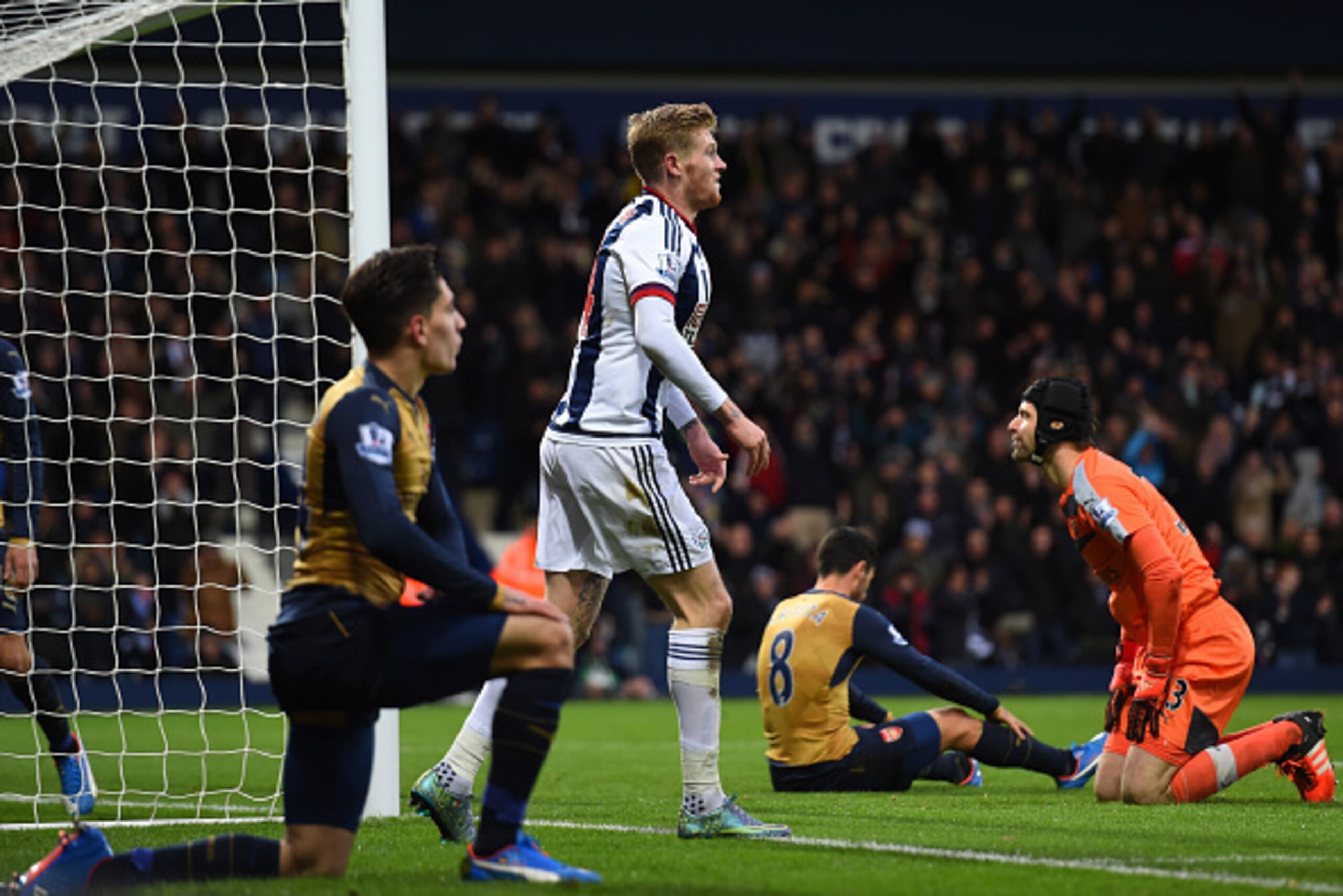 WEST BROMWICH, ENGLAND - NOVEMBER 21:  James McClean of West Bromwich Albion (2nd L) celebrates his team's second goal scored by Mikel Arteta (2nd R) of Arsenal during the Barclays Premier League match between West Bromwich Albion and Arsenal at The Hawth