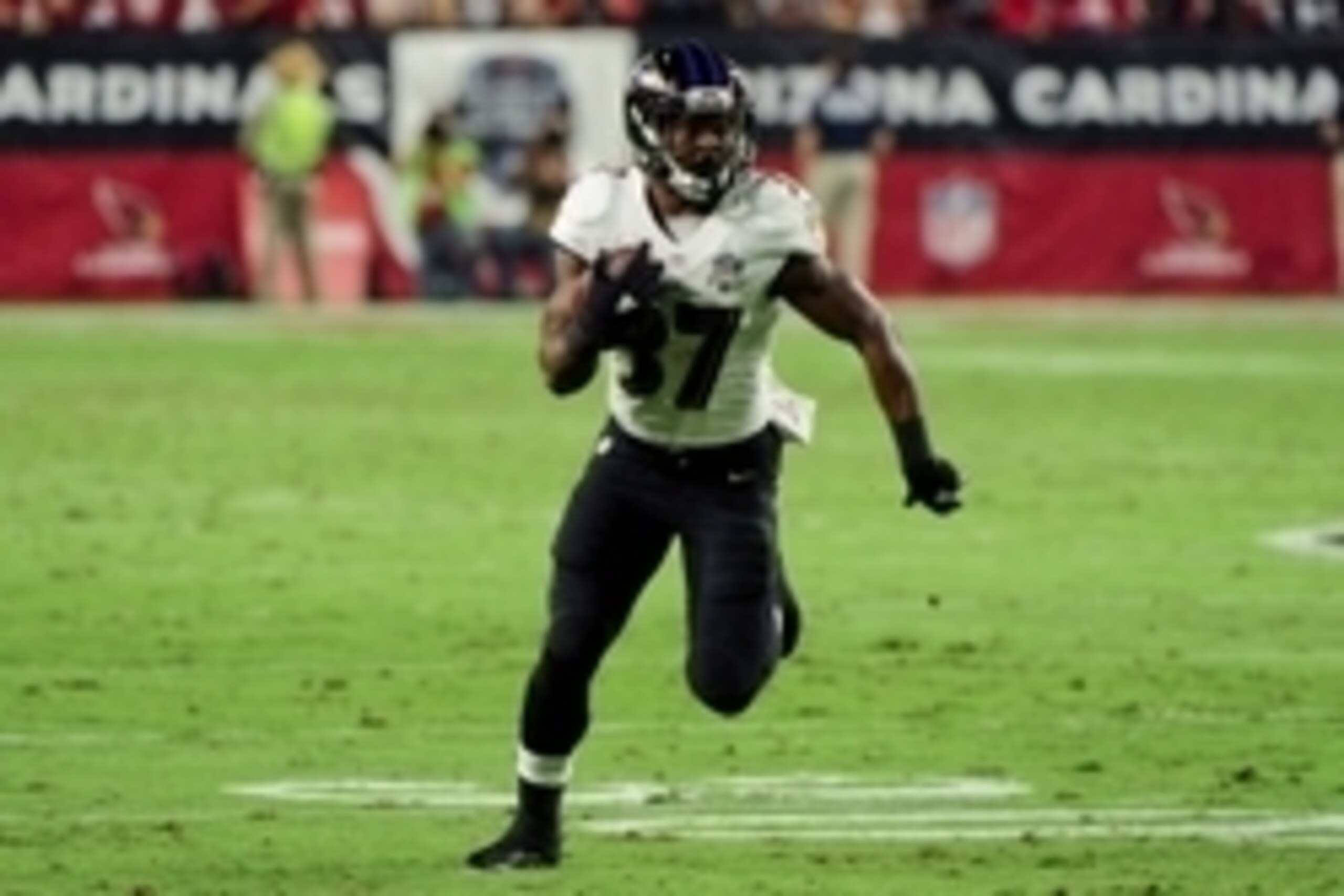 Oct 26, 2015; Glendale, AZ, USA; Baltimore Ravens running back Javorius Allen (37) runs with the ball after a catch in the first half against the Arizona Cardinals at University of Phoenix Stadium. Mandatory Credit: Matt Kartozian-USA TODAY Sports