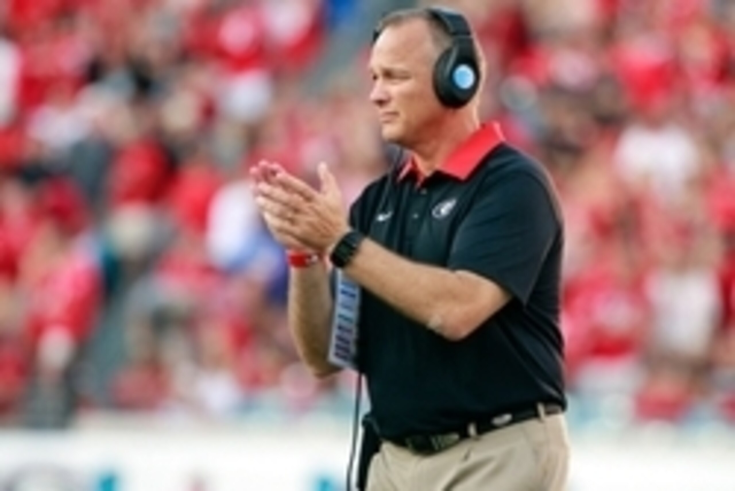 Oct 31, 2015; Jacksonville, FL, USA; Georgia Bulldogs head coach Mark Richt claps against the Florida Gators during the second half at  EverBank Stadium. Florida Gators defeated the Georgia Bulldogs 27-3. Mandatory Credit: Kim Klement-USA TODAY Sports