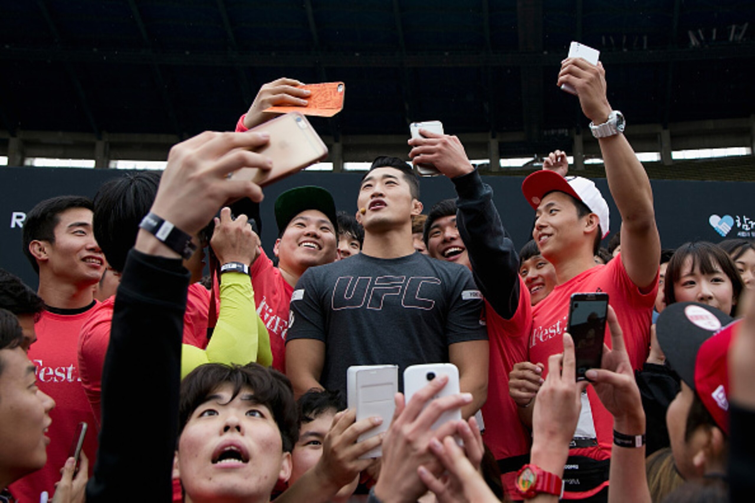 SEOUL, SOUTH KOREA - OCTOBER 11:  Kim Dong-Hyun aka Dong Hyun Kim poses with Korean fans at the UFC Reebok FitFest 2015 - MMA (Mixed Martial Arts) Class on October 11, 2015 in Seoul, South Korea.  (Photo by Han Myung-Gu / Zuffa LLC/Zuffa LLC via Getty Ima