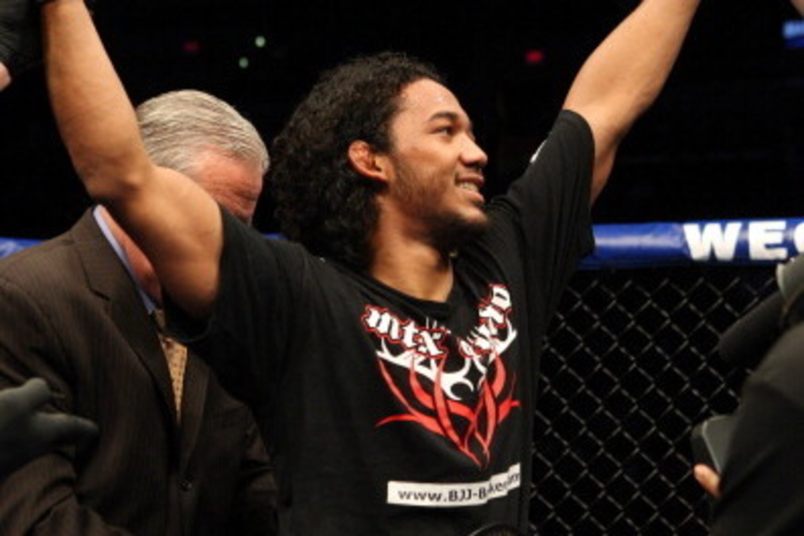 SAN ANTONIO, TX - OCTOBER 10:  Ben Henderson celebrates a hard fought victory over Donald Cerrone to capture the interim WEC Lightweight Championship on October 10, 2009 in San Antonio, Texas.  (Photo by Josh Hedges/Zuffa LLC/Zuffa LLC via Getty Images)