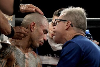 LAS VEGAS, NV - NOVEMBER 21:  Miguel Cotto talks with trainer Freddie Roach as he takes on Canelo Alvarez during their middleweight fight at the Mandalay Bay Events Center on November 21, 2015 in Las Vegas, Nevada.  (Photo by Isaac Brekken/Getty Images)