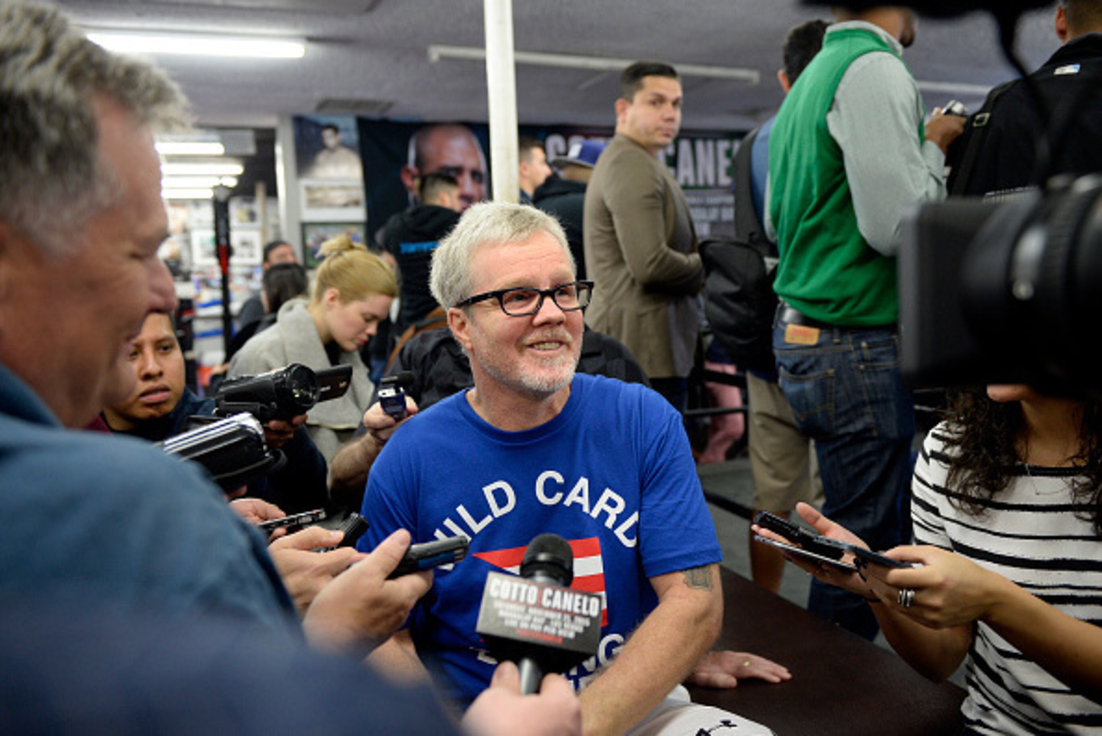HOLLYWOOD CA - NOVEMBER 4: Trainer Freddie Roach for boxer Miguel Cotto during a media workout at Wild Card Boxing Club November 4, 2015, in Hollywood, California. Cotto and former WBC and WBA Super Welterweight World Champion Canelo Alvarez will face eac HOLLYWOOD CA - NOVEMBER 4: Trainer Freddie Roach for boxer Miguel Cotto during a media workout at Wild Card Boxing Club November 4, 2015, in Hollywood, California. Cotto and former WBC and WBA Super Welterweight World Champion Canelo Alvarez will face eac