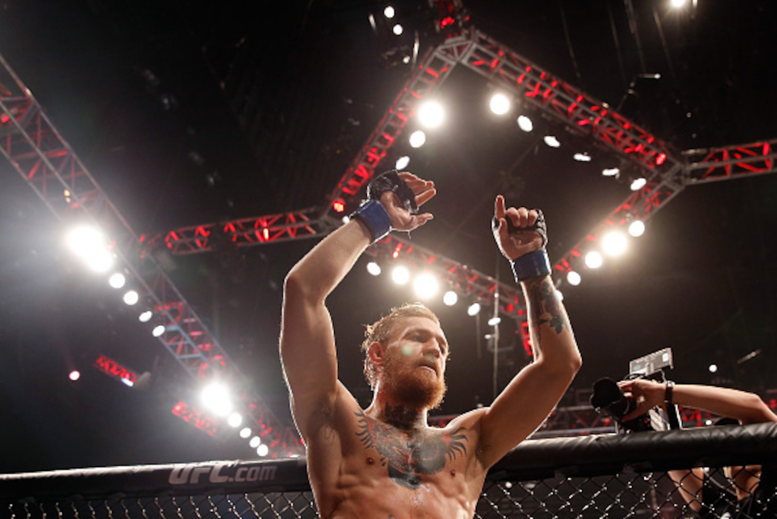LAS VEGAS, NV - JULY 11: Conor McGregor reacts to his victory over Chad Mendes in their UFC interim featherweight title fight during the UFC 189 event inside MGM Grand Garden Arena on July 11, 2015 in Las Vegas, Nevada. (Photo by Christian Petersen/Zuf LAS VEGAS, NV - JULY 11: Conor McGregor reacts to his victory over Chad Mendes in their UFC interim featherweight title fight during the UFC 189 event inside MGM Grand Garden Arena on July 11, 2015 in Las Vegas, Nevada. (Photo by Christian Petersen/Zuf