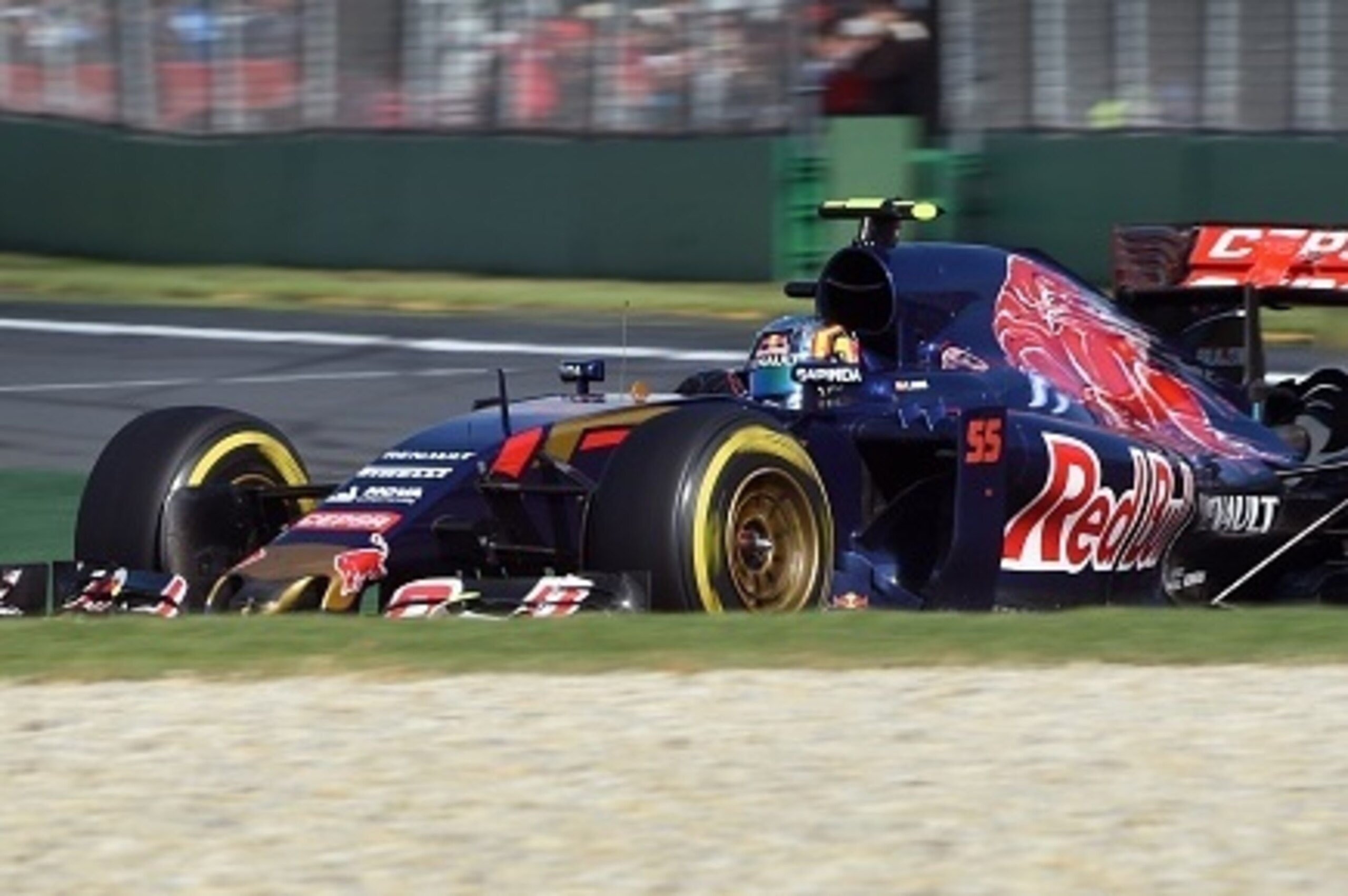 Scuderia Toro Rosso's Spanish driver Carlos Sainz Jr speeds through a corner during the Formula One Australian Grand Prix in Melbourne on March 15, 2015. AFP PHOTO / William WEST --IMAGE RESTRICTED TO EDITORIAL USE - STRICTLY NO COMMERCIAL USE-- Scuderia Toro Rosso's Spanish driver Carlos Sainz Jr speeds through a corner during the Formula One Australian Grand Prix in Melbourne on March 15, 2015. AFP PHOTO / William WEST --IMAGE RESTRICTED TO EDITORIAL USE - STRICTLY NO COMMERCIAL USE--