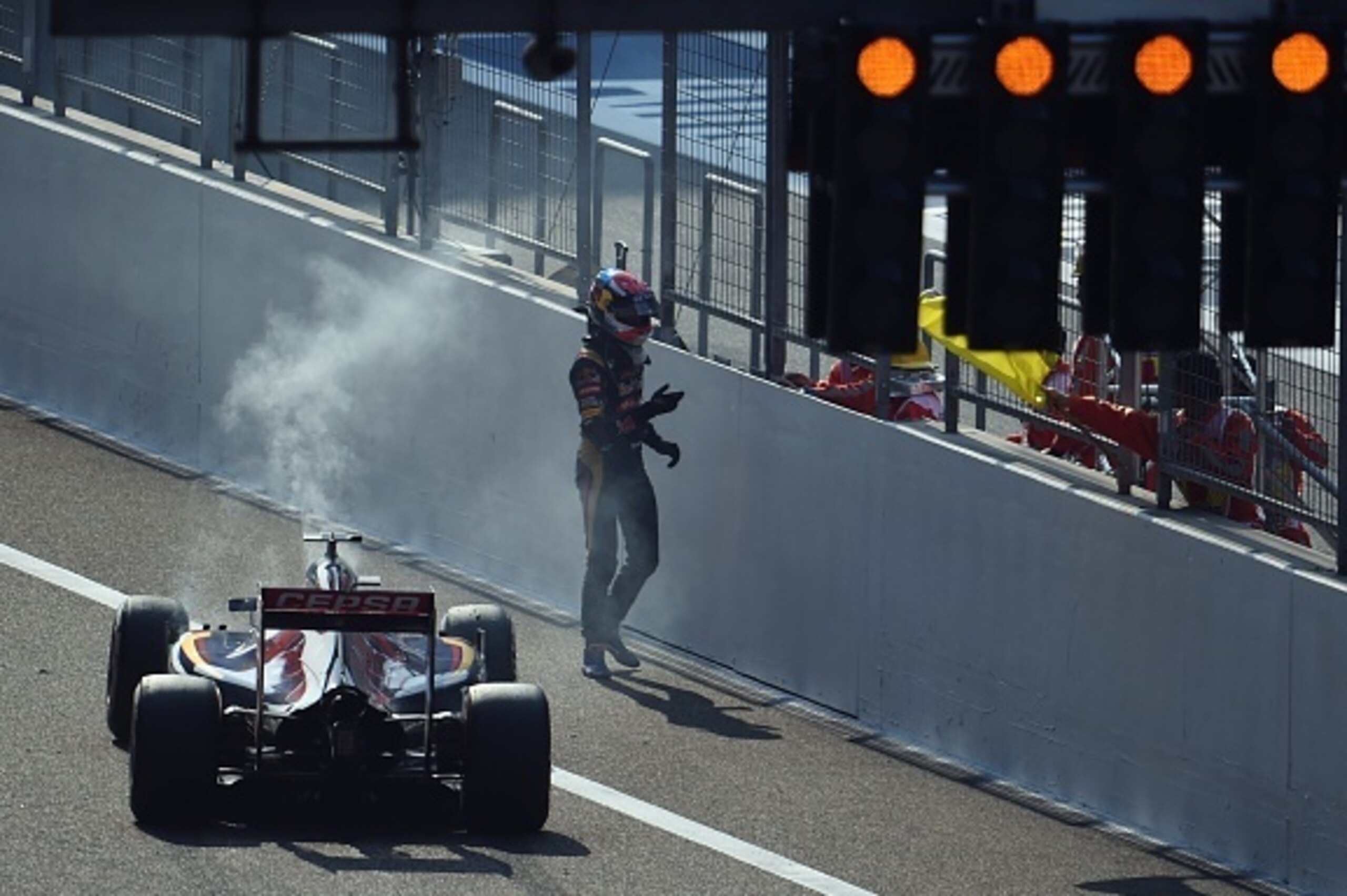 Scuderia Toro Rosso's Dutch driver Max Verstappen gets out of his smoking car during the Formula One Chinese Grand Prix in Shanghai on April 12, 2015. AFP PHOTO / JOHANNES EISELE (Photo credit should read JOHANNES EISELE/AFP/Getty Images) Scuderia Toro Rosso's Dutch driver Max Verstappen gets out of his smoking car during the Formula One Chinese Grand Prix in Shanghai on April 12, 2015. AFP PHOTO / JOHANNES EISELE (Photo credit should read JOHANNES EISELE/AFP/Getty Images)