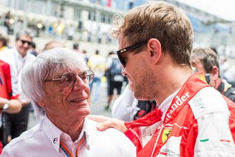 SAO PAULO, BRAZIL - NOVEMBER 15:  Bernie Ecclestone of Great Britain with Sebastian Vettel of Ferrari and Germany during the Formula One Grand Prix of Brazil at Autodromo Jose Carlos Pace on November 15, 2015 in Sao Paulo, Brazil.  (Photo by Peter J Fox/G