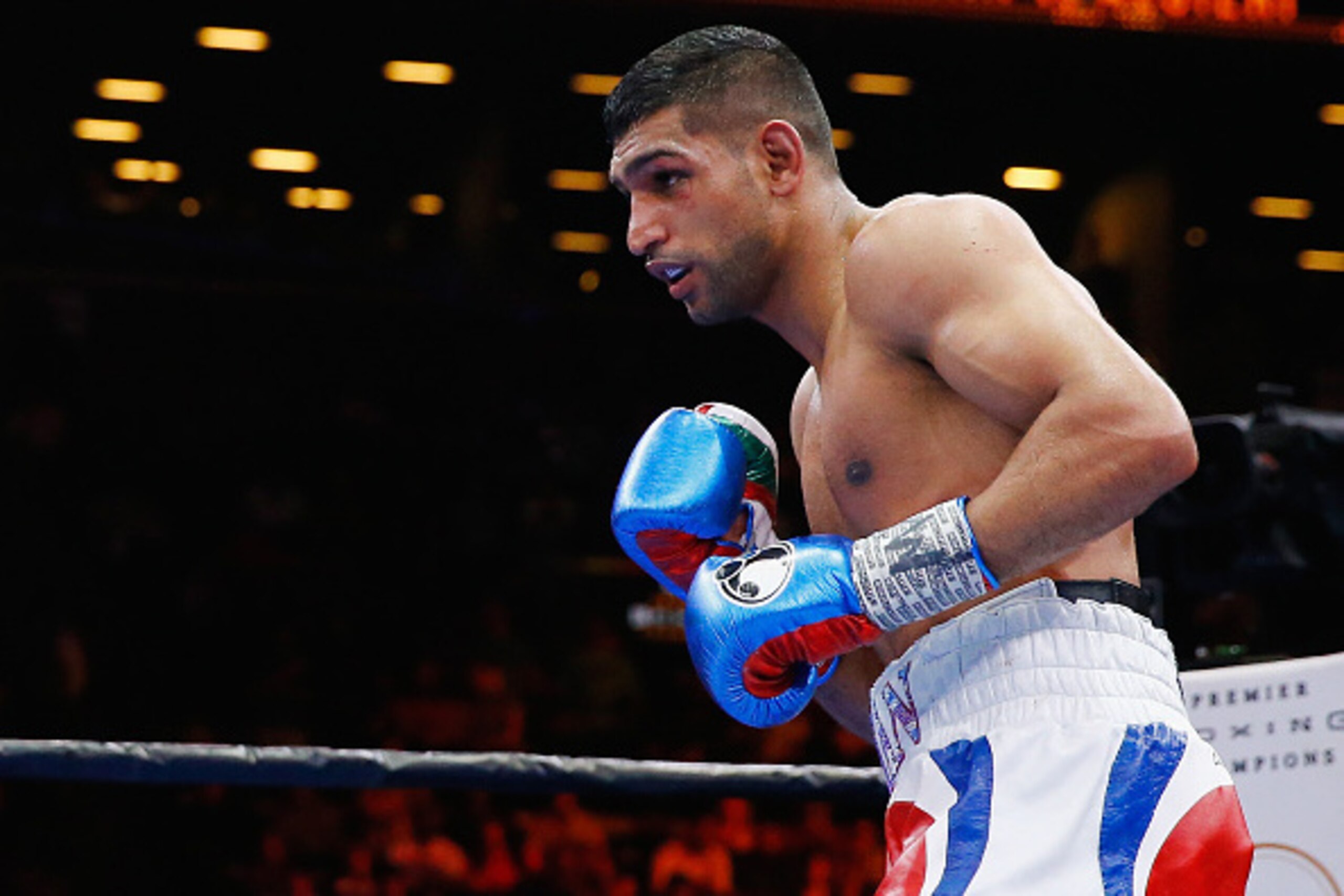 NEW YORK, NY - MAY 29: Amir Khan in action against Chris Algieri during their Welterweight bout at Barclays Center of Brooklyn on May 29, 2015 in New York City. (Photo by Al Bello/Getty Images) NEW YORK, NY - MAY 29: Amir Khan in action against Chris Algieri during their Welterweight bout at Barclays Center of Brooklyn on May 29, 2015 in New York City. (Photo by Al Bello/Getty Images)