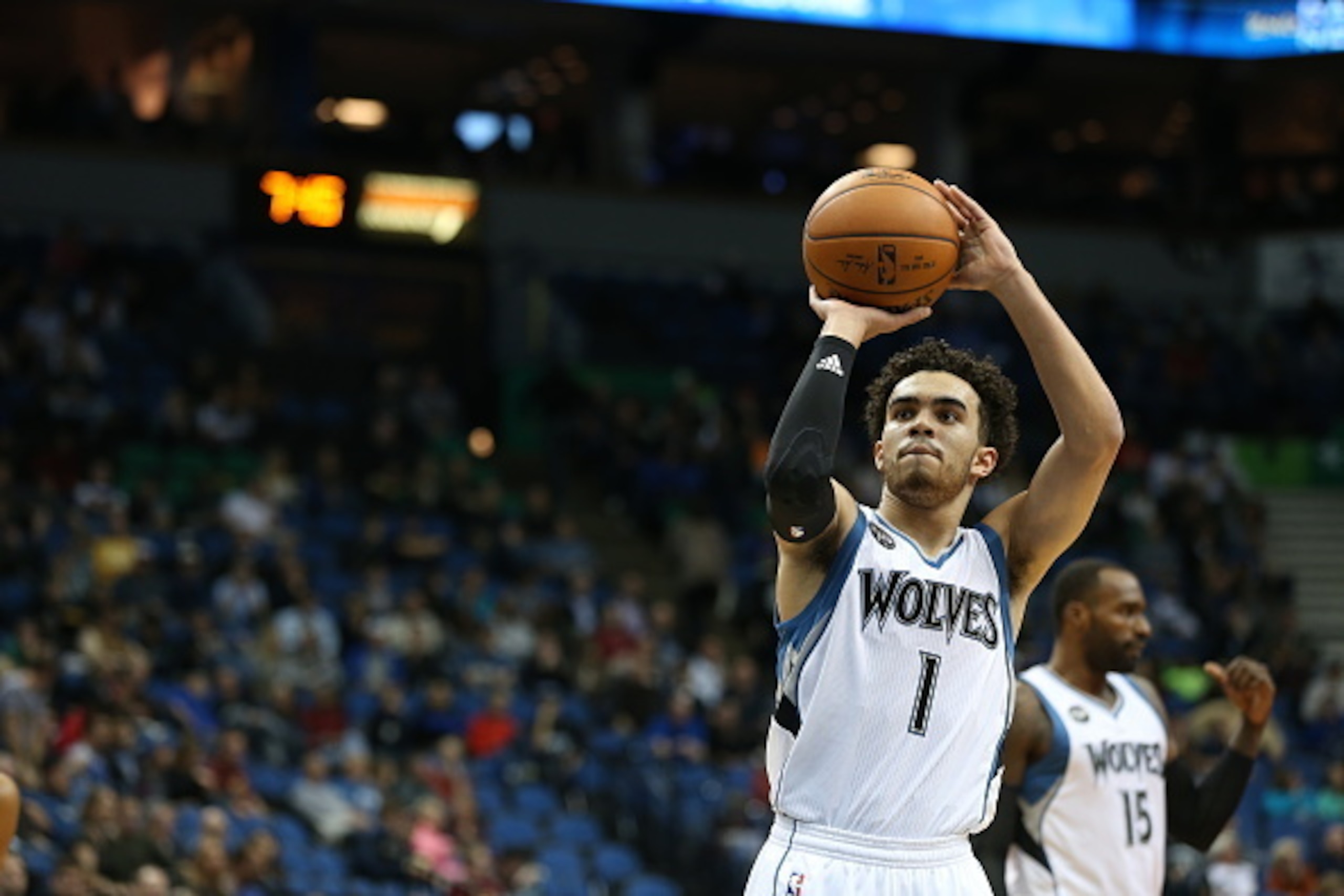 MINNEAPOLIS, MN -  NOVEMBER 10:  Tyus Jones #1 of the Minnesota Timberwolves shoots a free throw against the Charlotte Hornets on November 10, 2015 at Target Center in Minneapolis, Minnesota. NOTE TO USER: User expressly acknowledges and agrees that, by d
